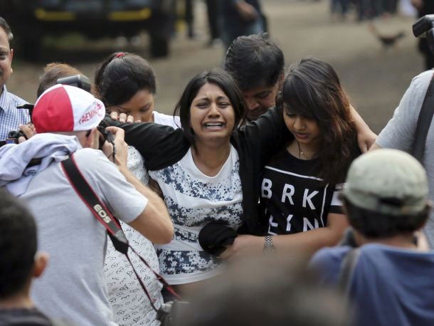 Brintha Sukumaran, the sister of Myuran Sukumaran, cries during her final visit to see him in prison on 28 April