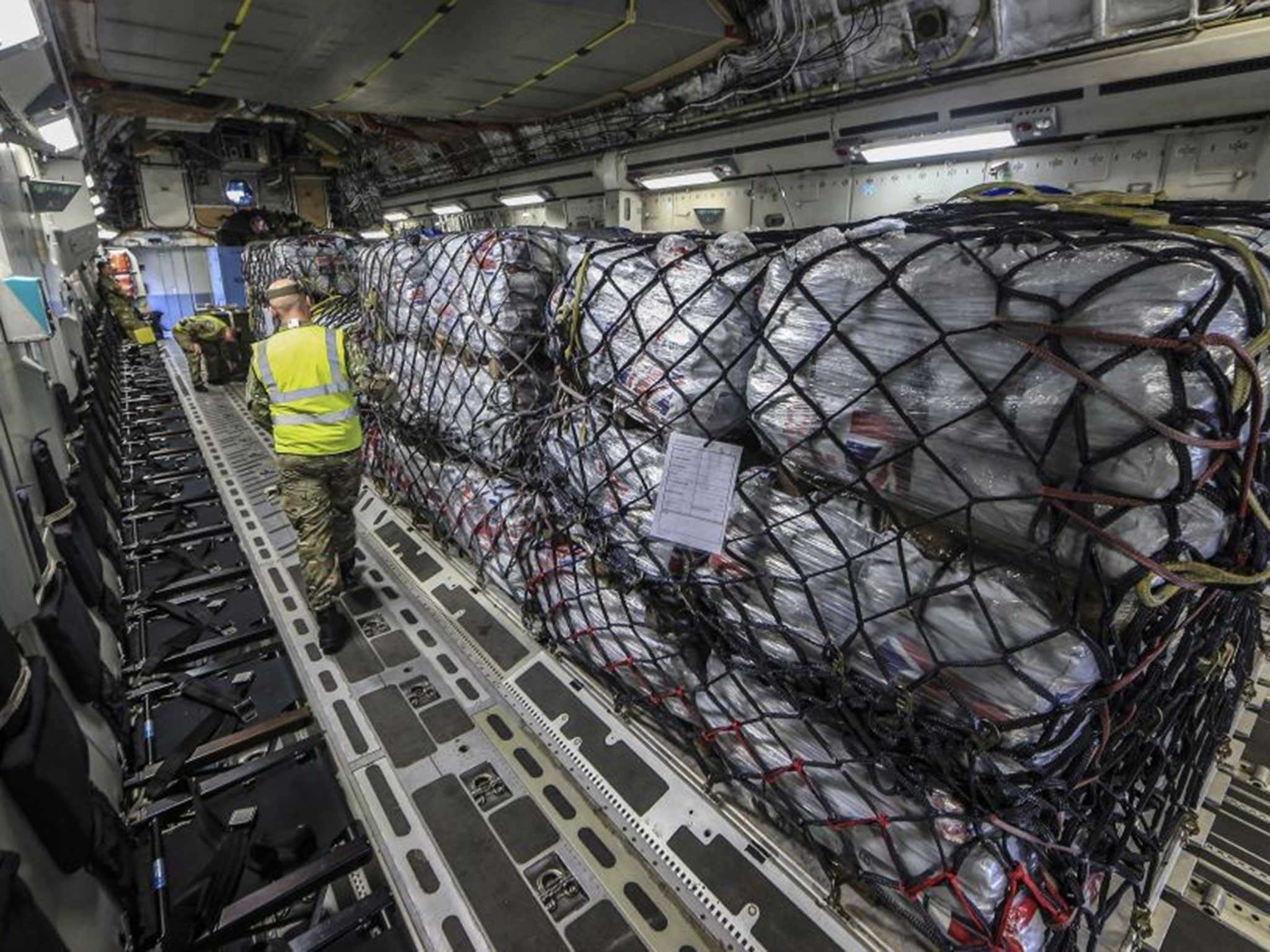 Checking the supplies before they fly out to Nepal