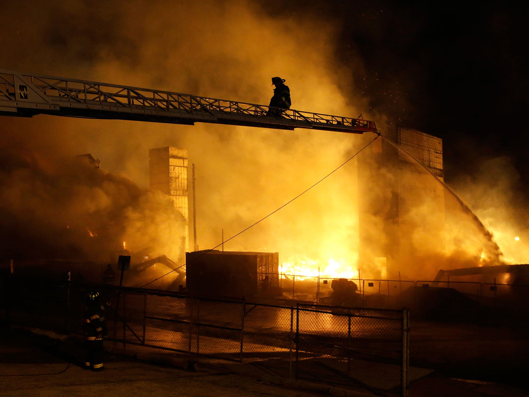 Rioters plunged part of Baltimore into chaos, torching a pharmacy, setting police cars ablaze and throwing bricks at officers