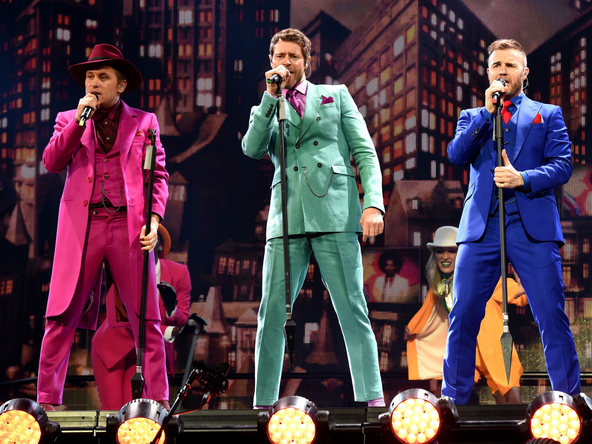 Take That's Mark Owen, Howard Donald and Gary Barlow perform at Glasgow's Hydro