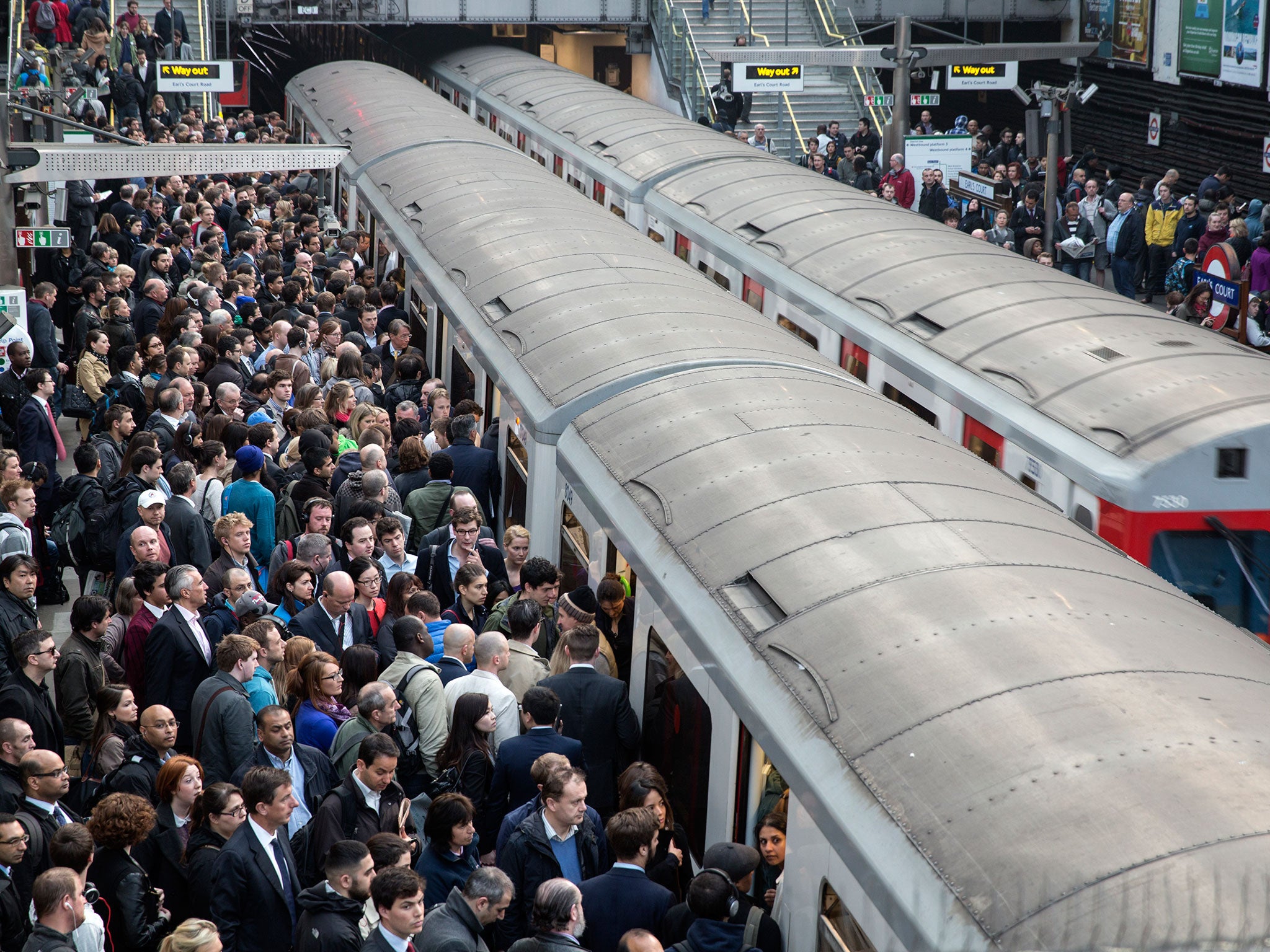 Commuters prepare to travel on the District Line of the London Underground which is running a limited service due to industrial action on April 30, 2014 in London, England. At 9pm on April 28, 2014 members of the Rail, Maritime and Transport (RMT) Union c