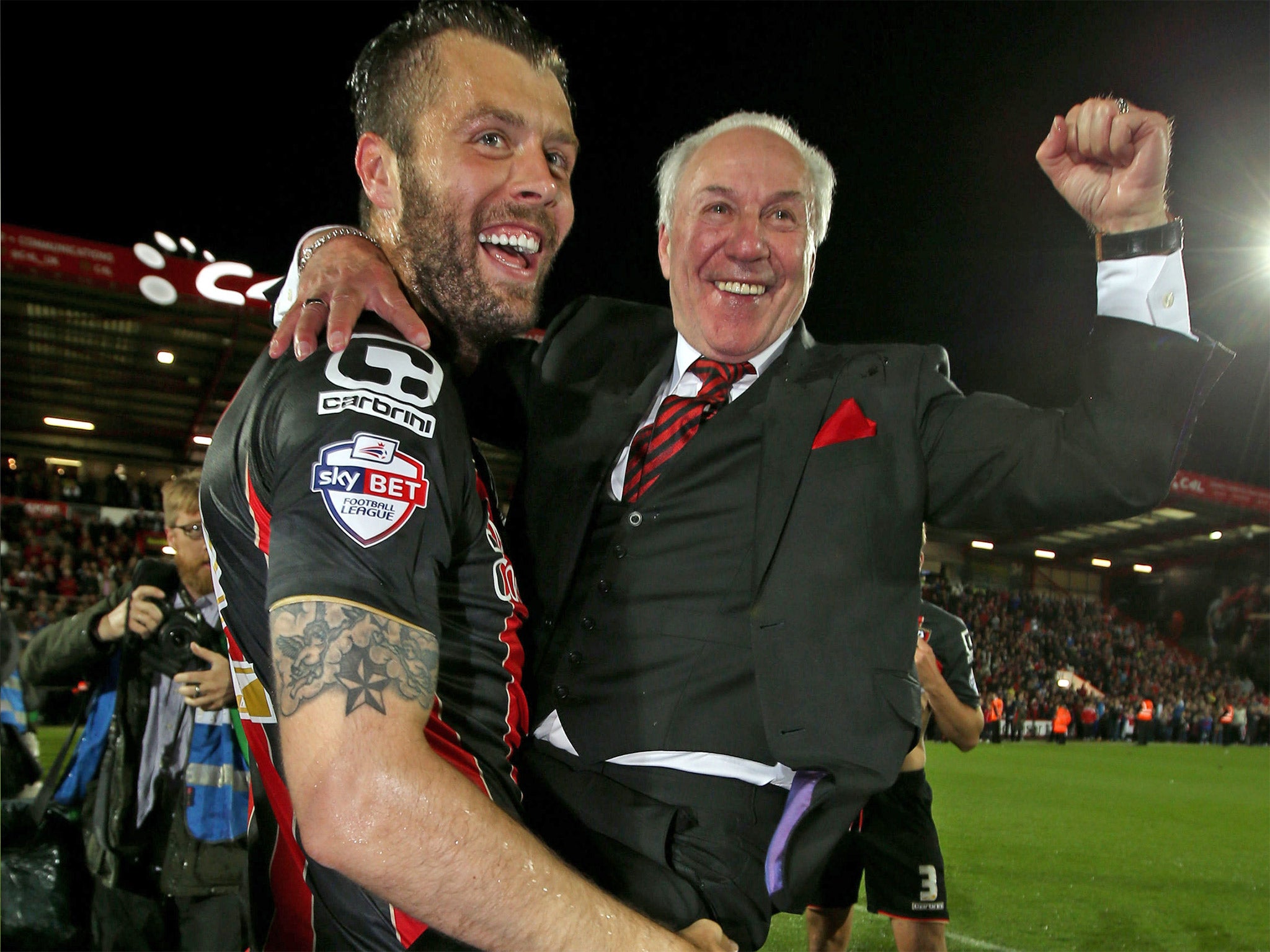 Elliott Ward celebrating with chairman Jeff Mostyn