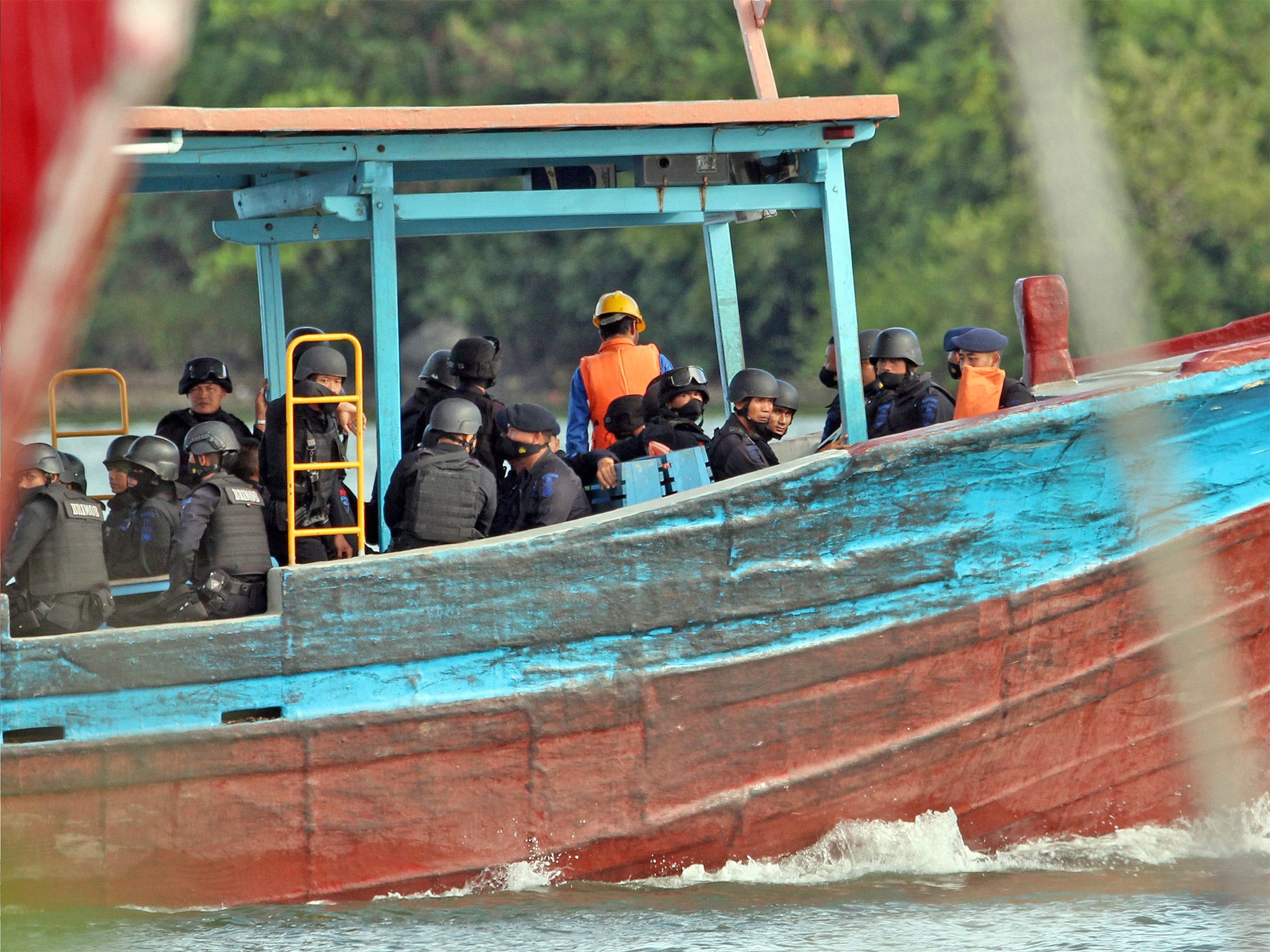 A police unit believed to be the execution team for death-row prisoners, on its way to Nusakambangan Island