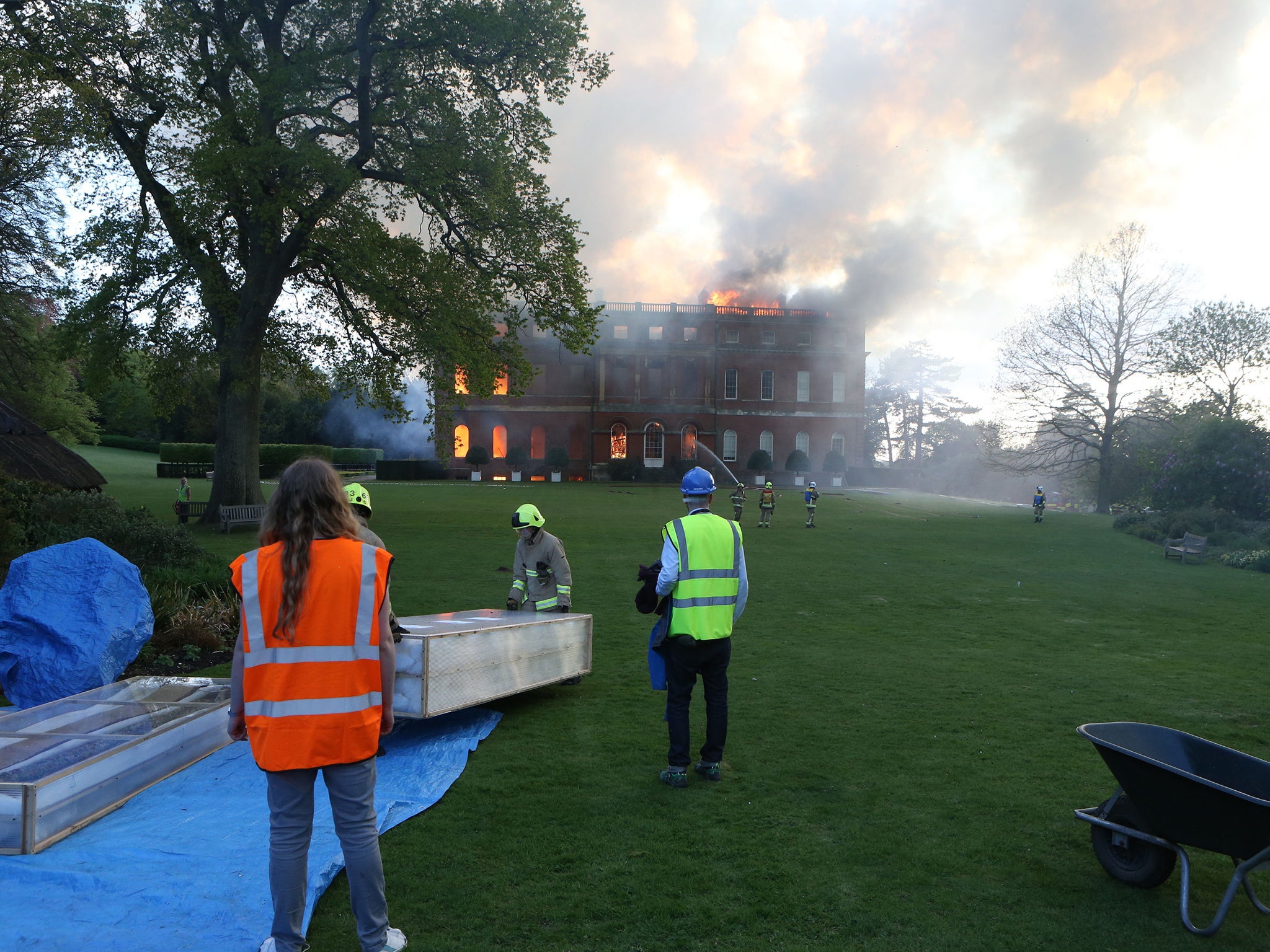 Dozens of firefighters battle a blaze at Clandon Park, an 18th century National Trust property near Guildford in Surrey. The fire is believed to have started in the basement of before spreading to the roof