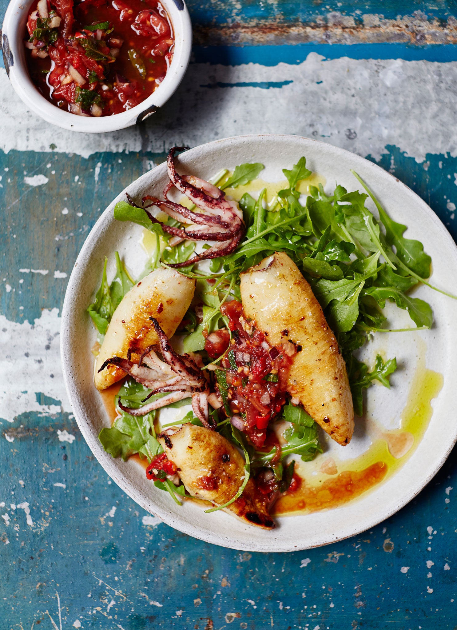 Spiced whole squid with burnt tomato and chilli salsa