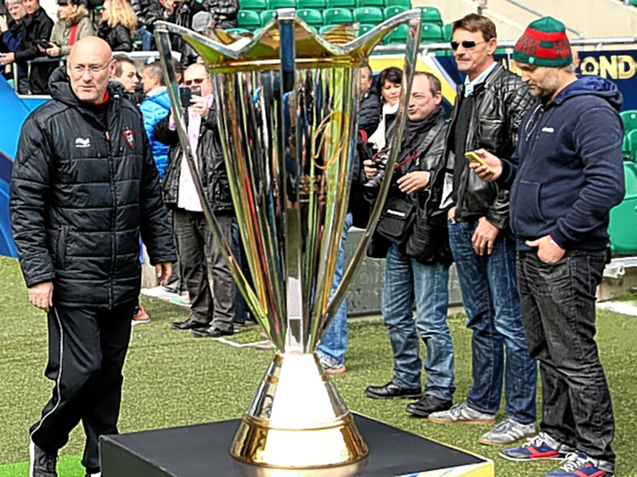 Toulon coach Bernard Laporte walks past the Champions Cup