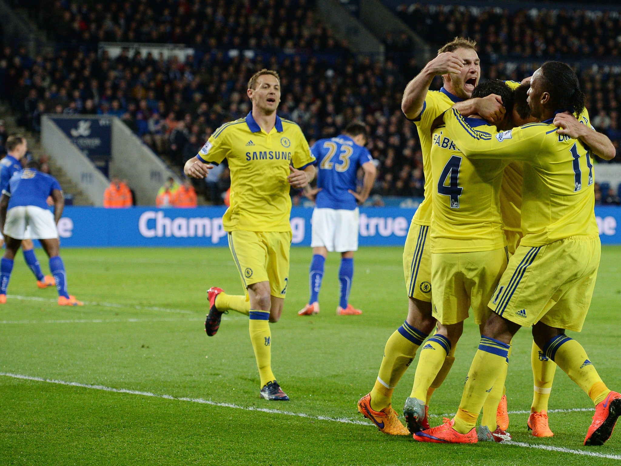 Chelsea players celebrate John Terry's goal against Leicester