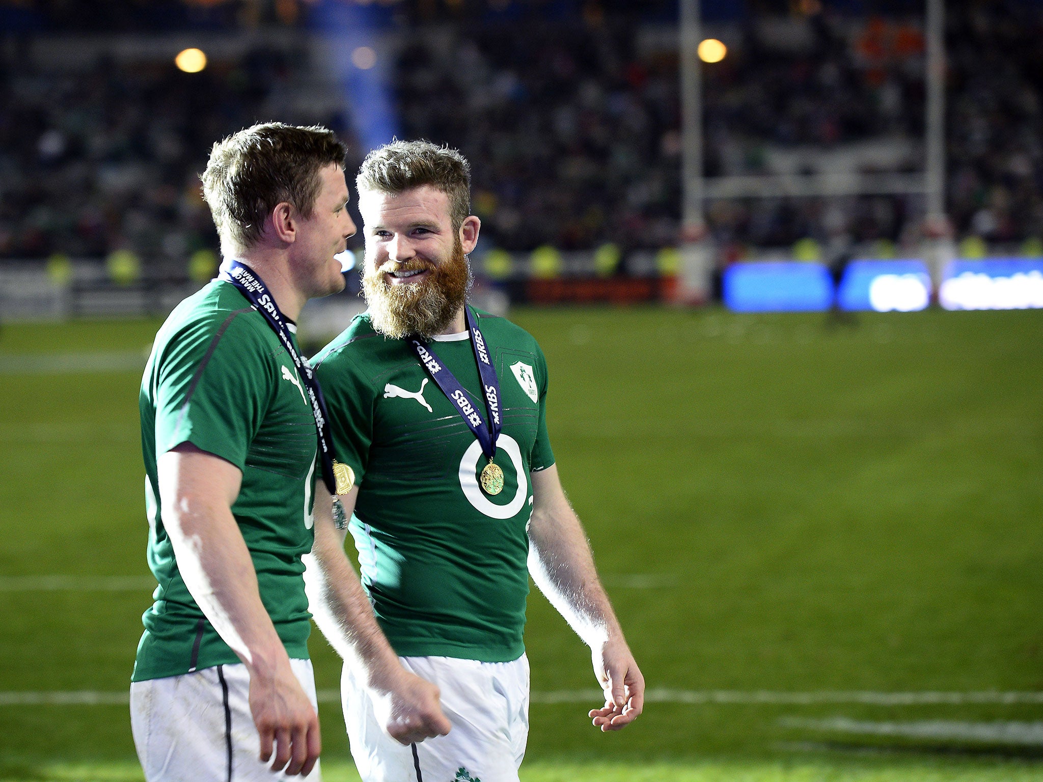 D'Arcy celebrates the 2014 Six Nations win alongside centre partner Brian O'Driscoll