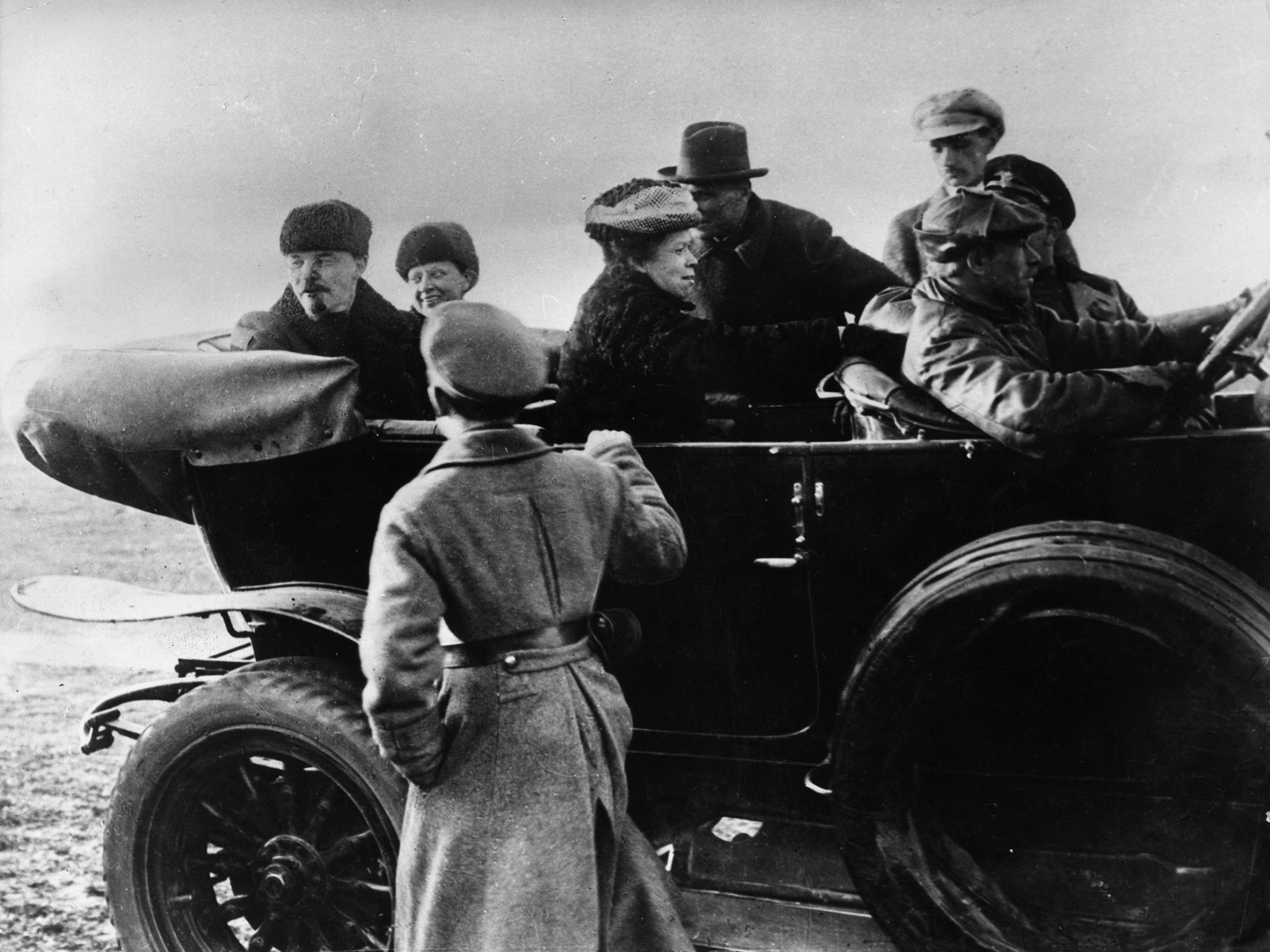 Lenin travels in a car with his wife Nadezhda Krupskaya (Hulton/Getty)