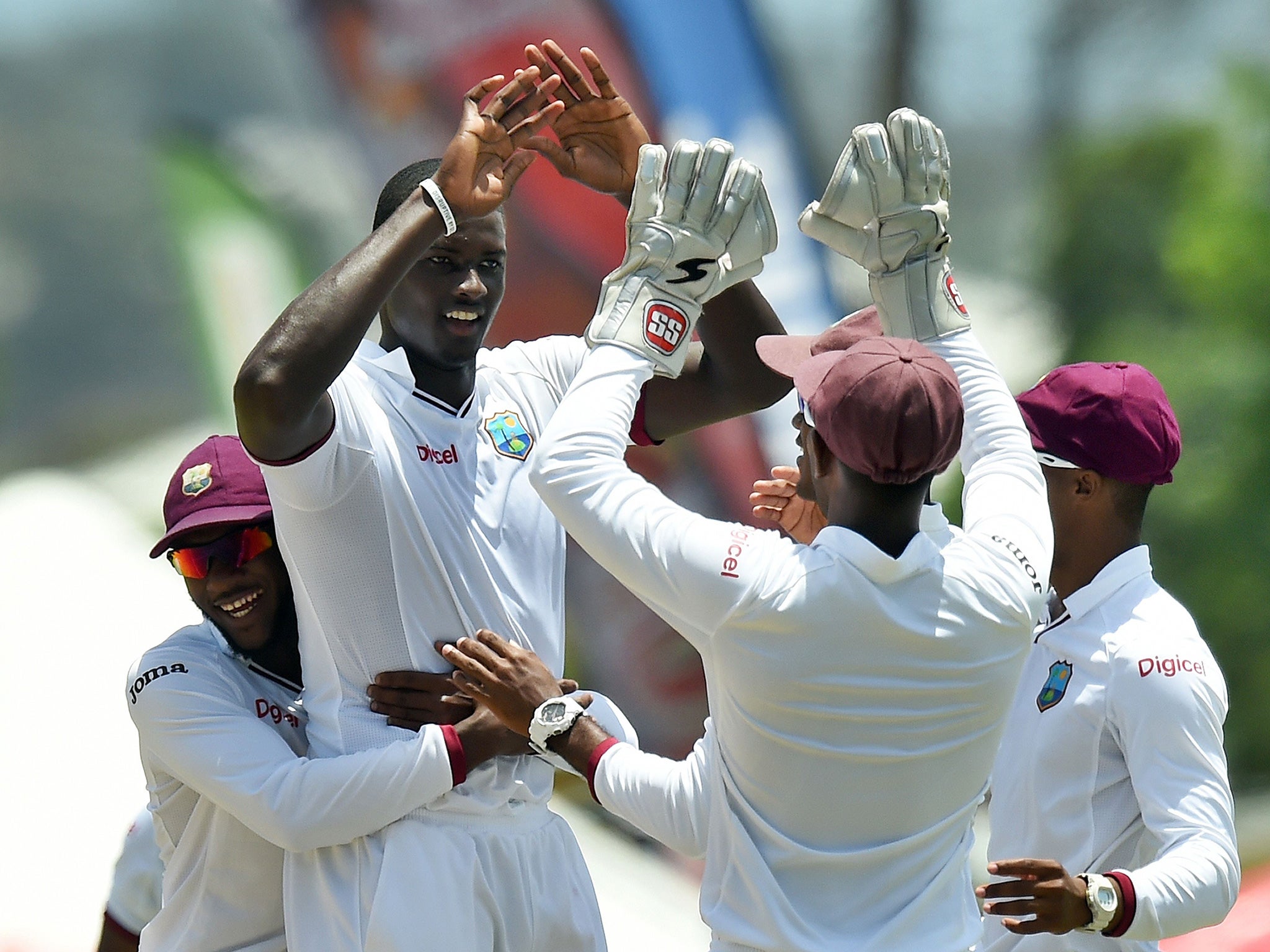 Jason Holder celebrates removing Ian Bell for nought (AFP/Getty)