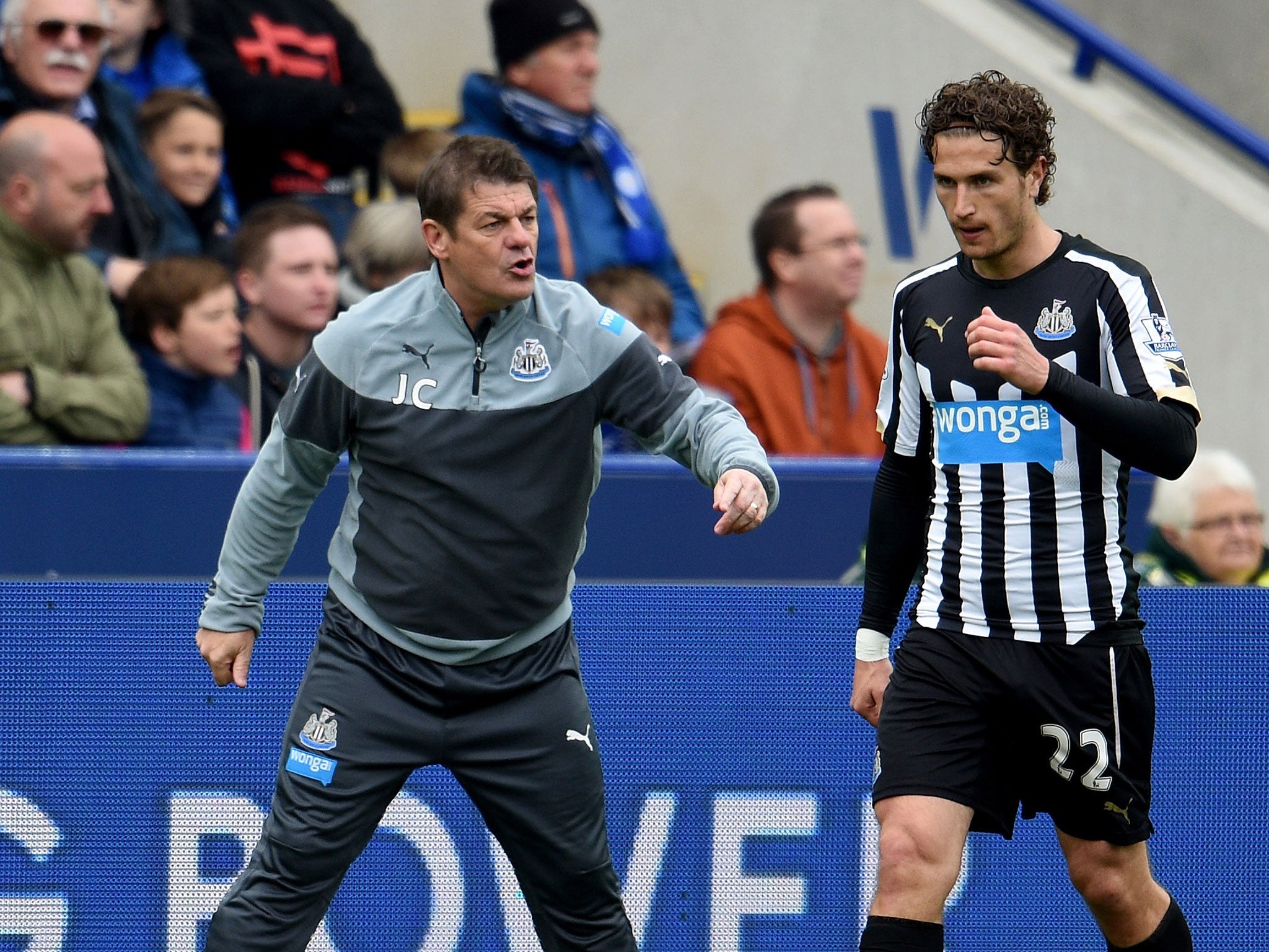 Carver offers instructions to Darryl Janmaat, who was also sent off in the 3-0 defeat to Leicester