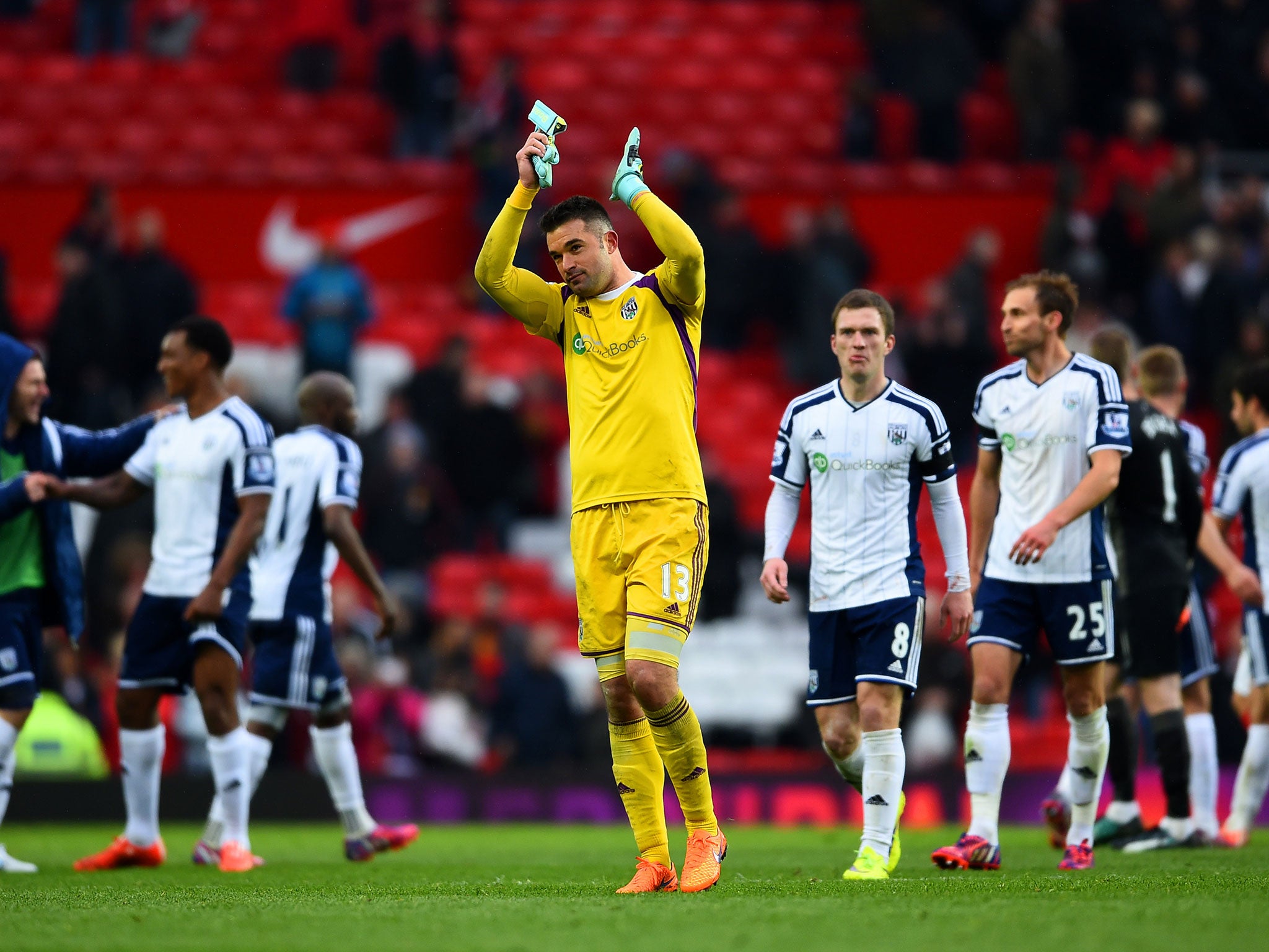 Boaz Myhill applauds the West Brom fans