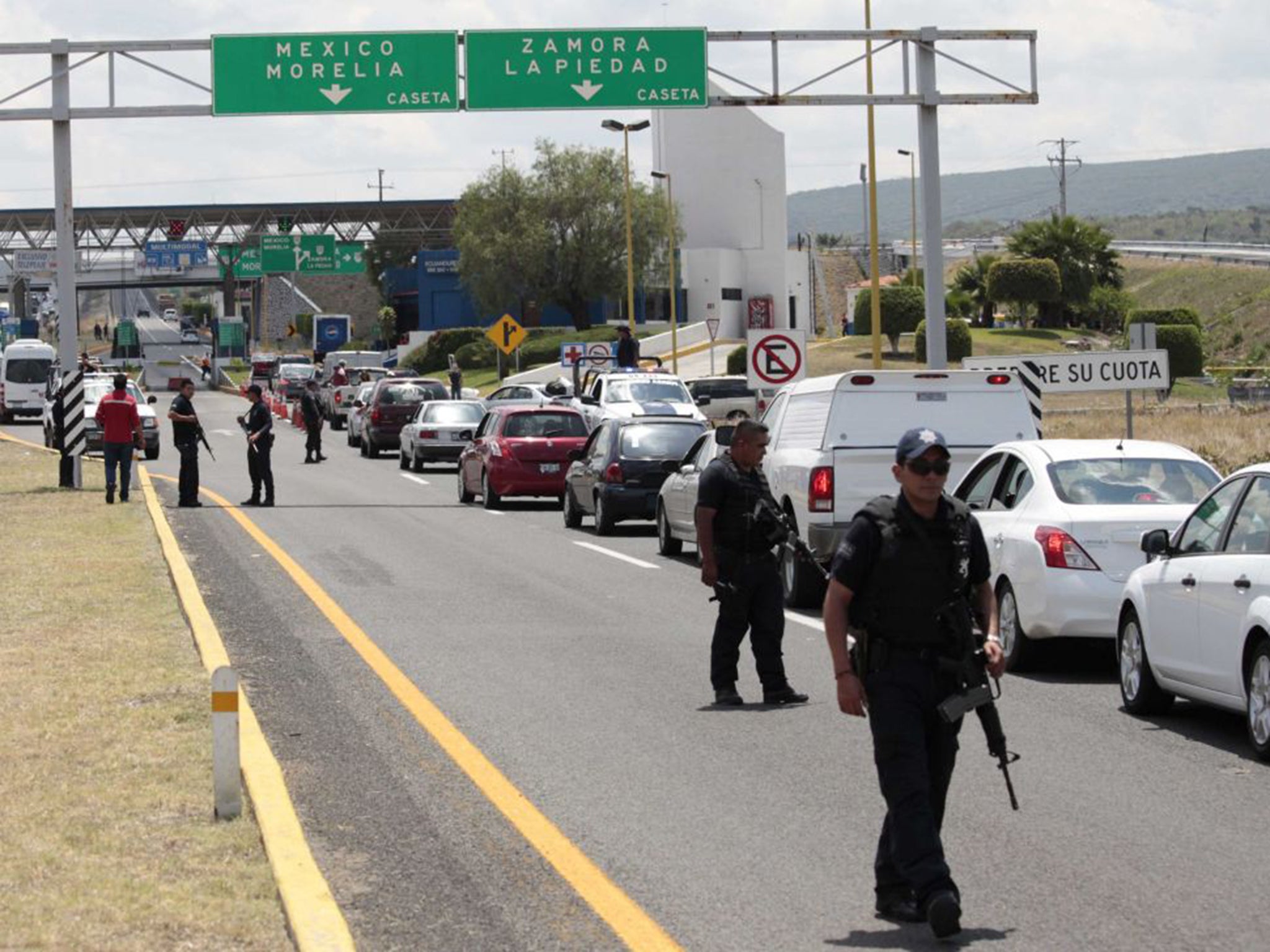 More than a dozen vehicles were set on fire on Friday across Guadalajara, while the drug cartel and authorities clashed in another part of Jalisco state