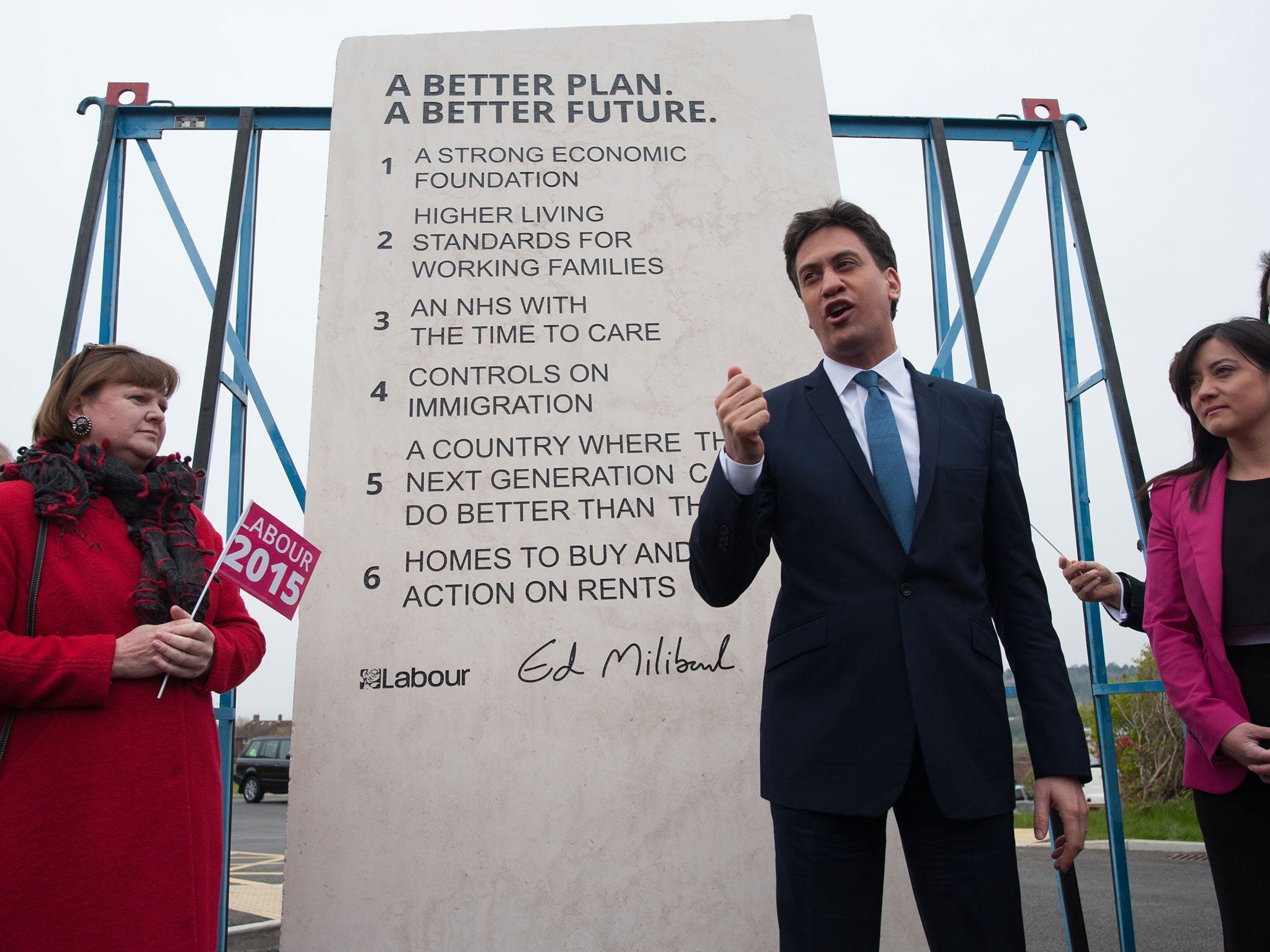 Labour leader Ed Miliband unveils Labour's pledges carved into a stone plinth in Hastings