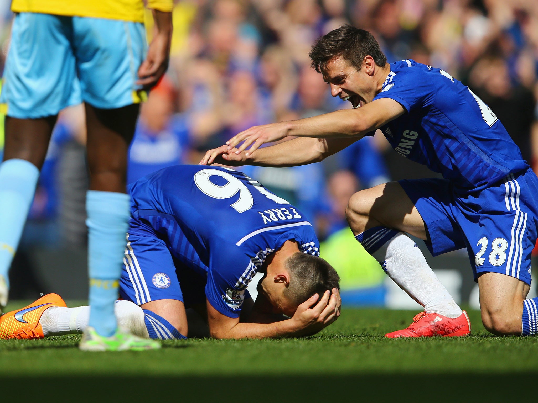 John Terry falls to the floor after the final whistle blew