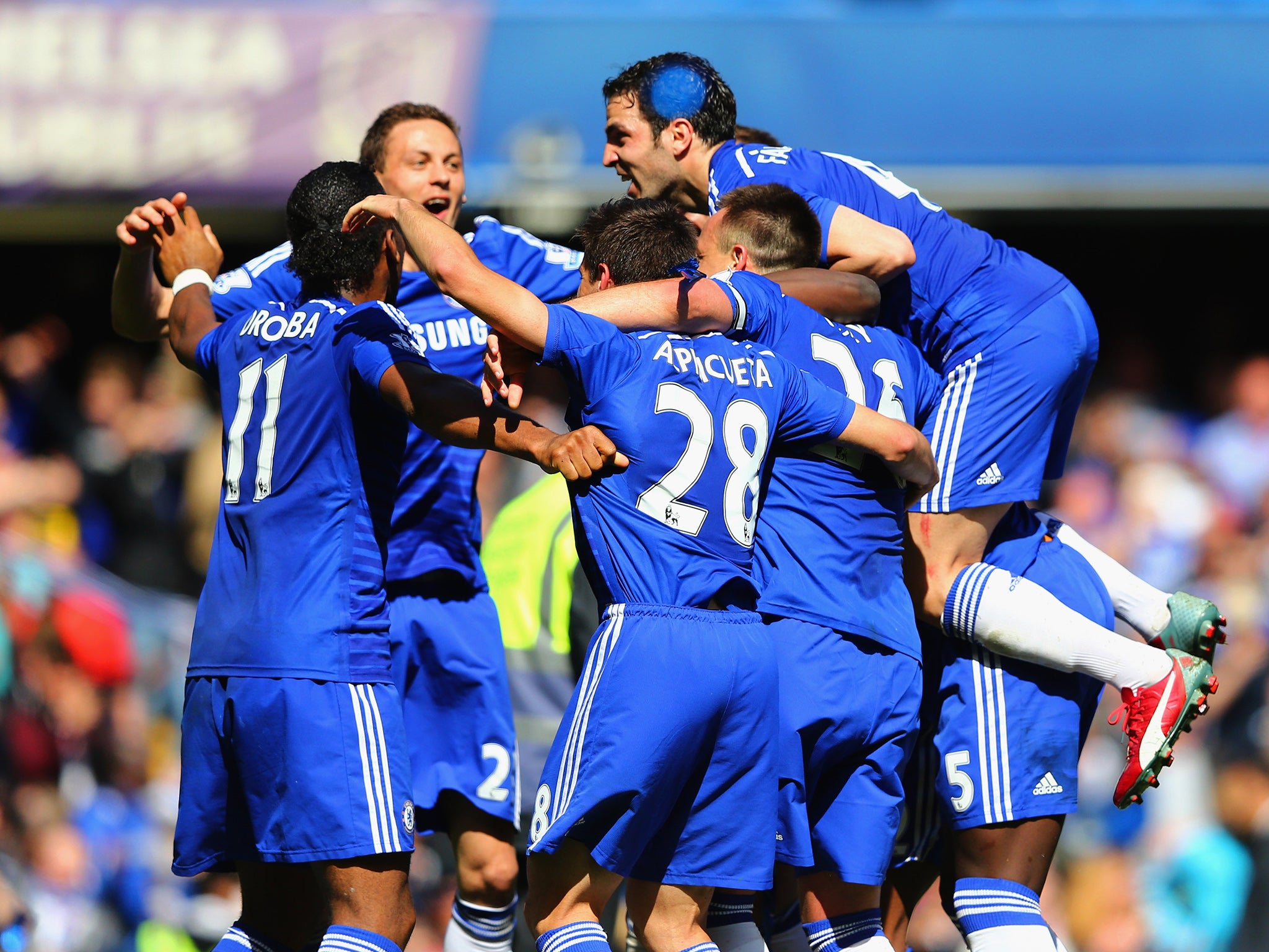 Chelsea players celebrate winning the Premier League title