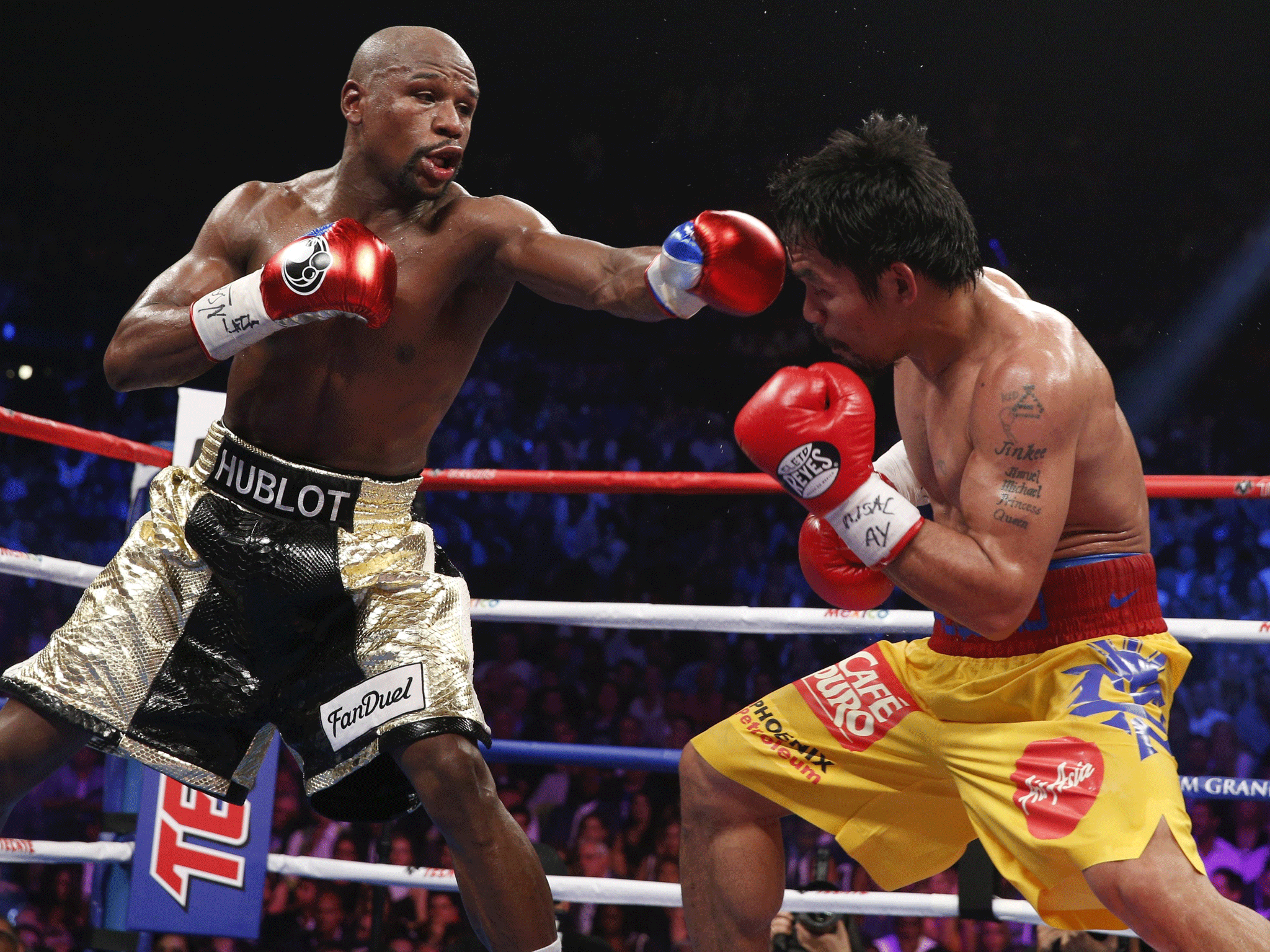 Mayweather lands a blow on Pacquiao