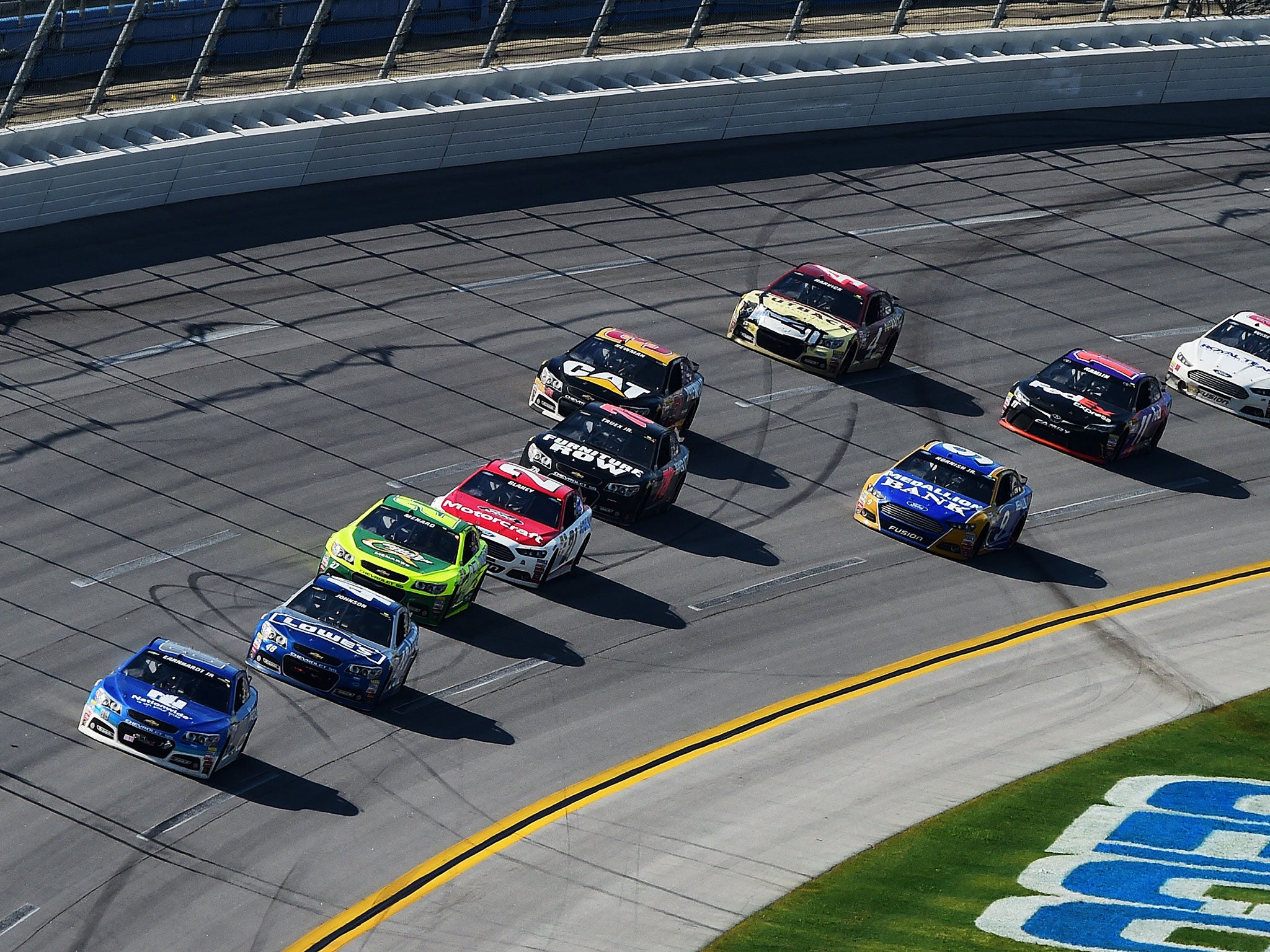 Dale Earnhardt Jr leads the field on the final lap at Talladega