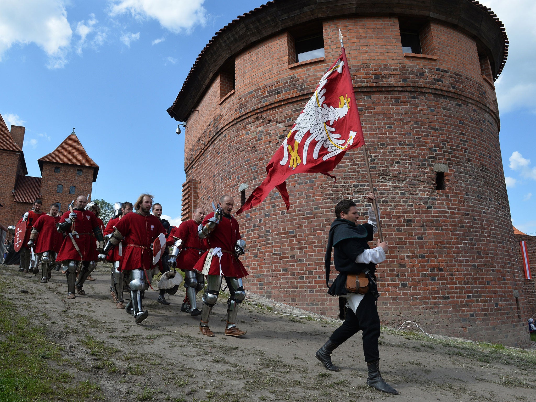 The victorious Polish team being led into battle