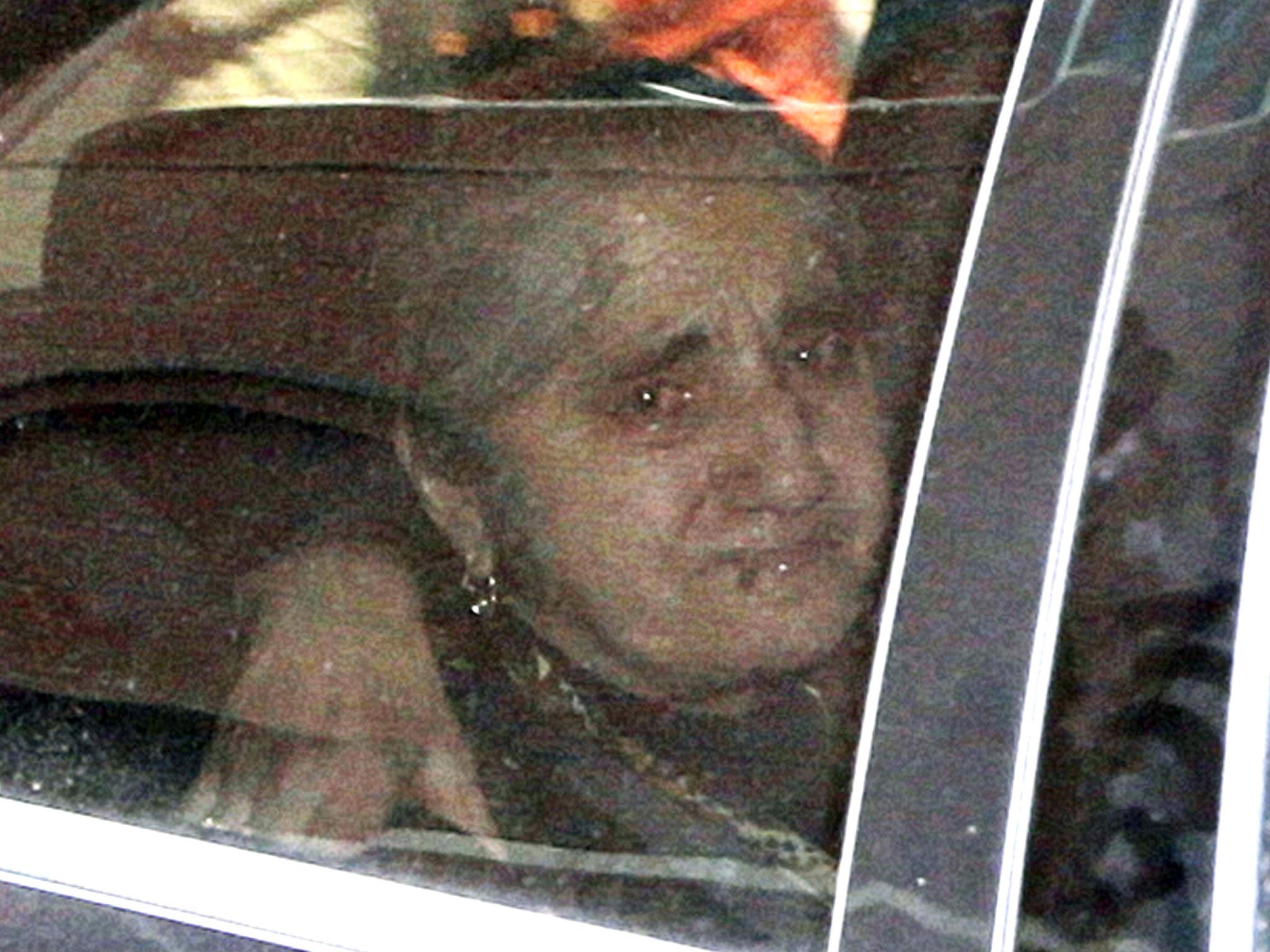 An emotional relative of Dzhokhar Tsarnaev leaves federal court in Boston after testifying Monday, May 4, 2015, during the penalty phase in Tsarnaev's trial.