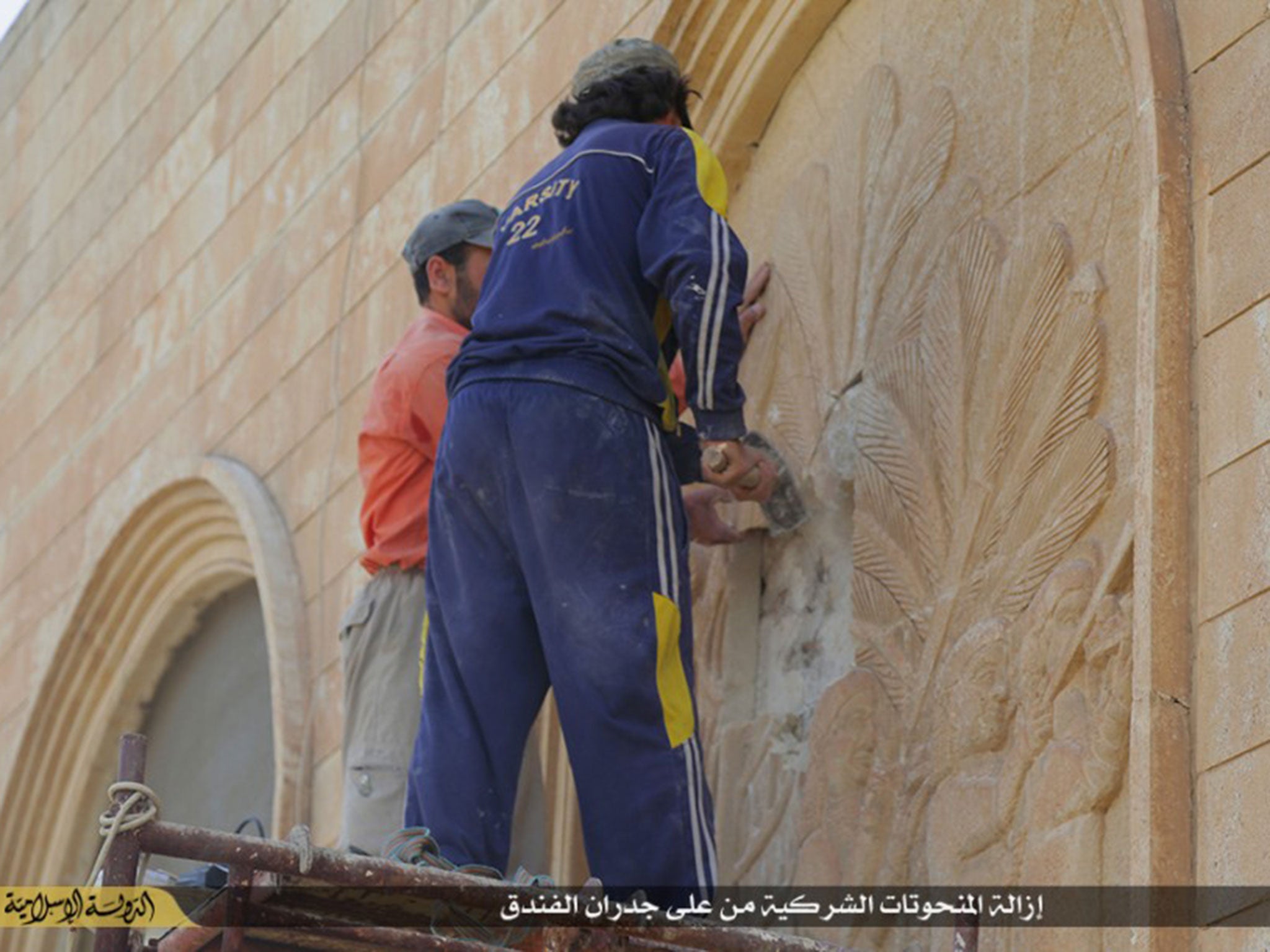 Black Isis flags can be seen flying outside the front of the building