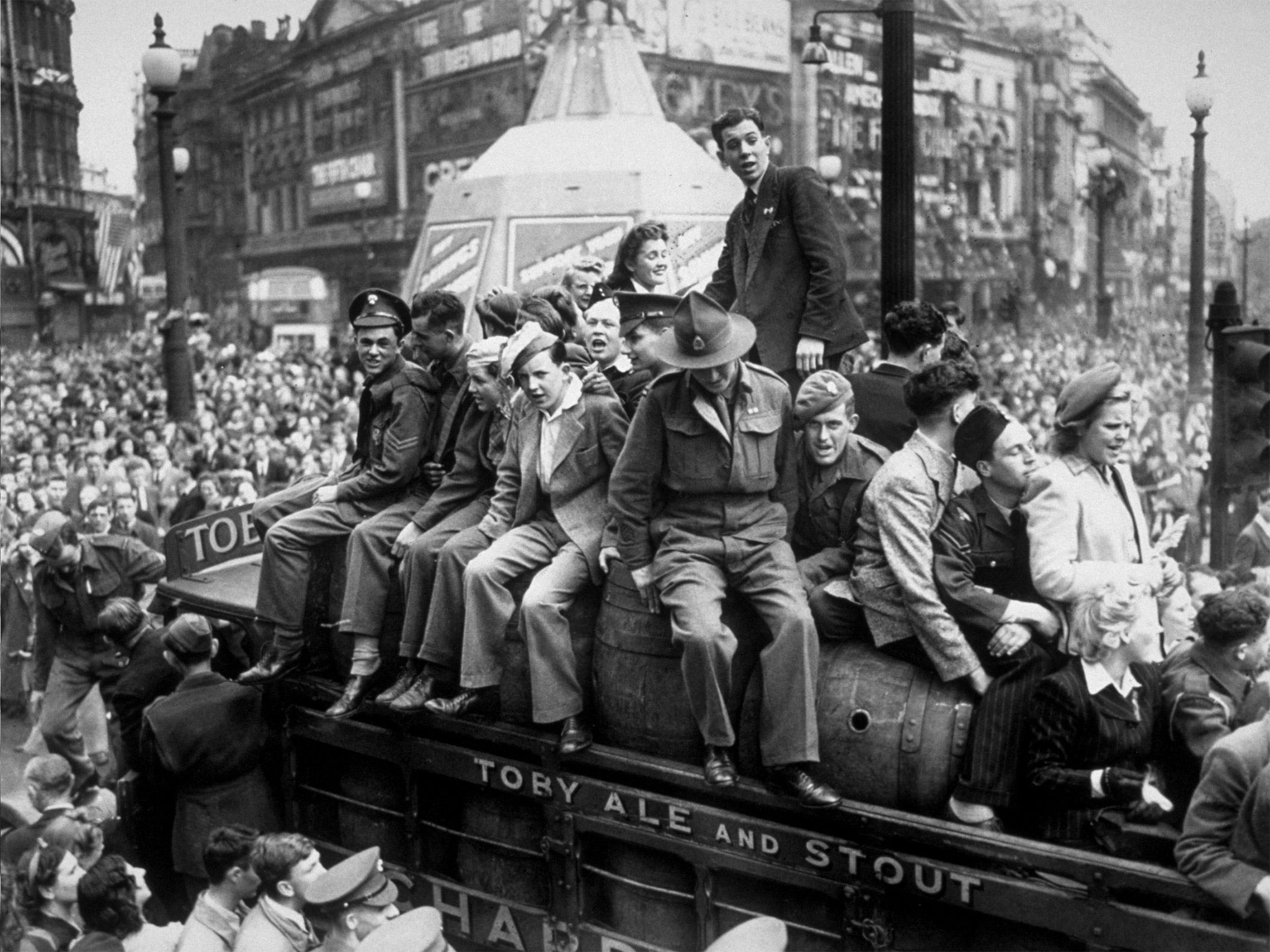 A van load of beer passes through Piccadilly Circus on VE Day (Getty)