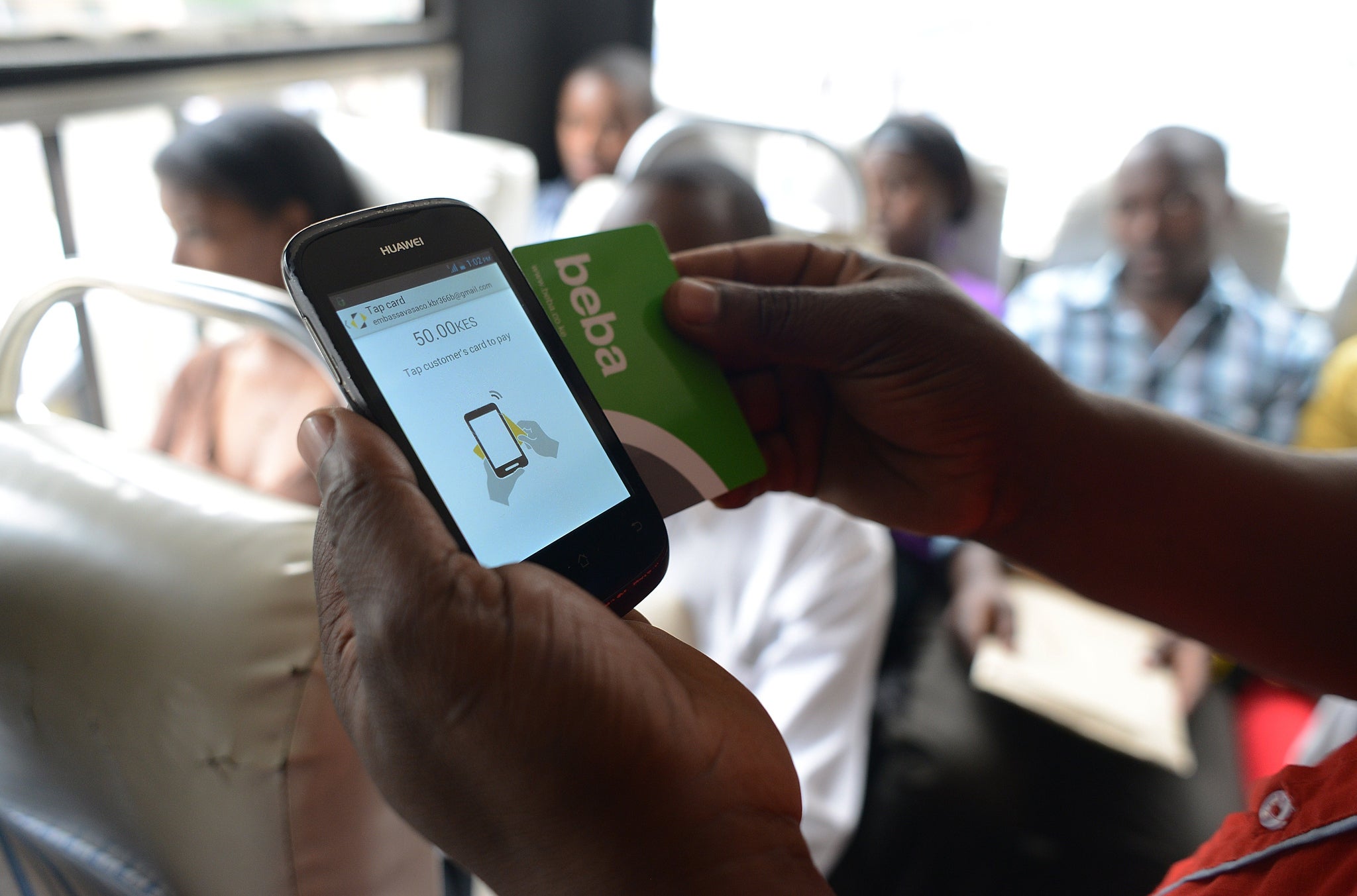 Cashless payments are growing in popularity in developing nations, as it removes costs associated with handling cash and lowers the danger of theft or extortion. Kenya's 'beba' system, seen here, allows users to transfer money via their mobiles.