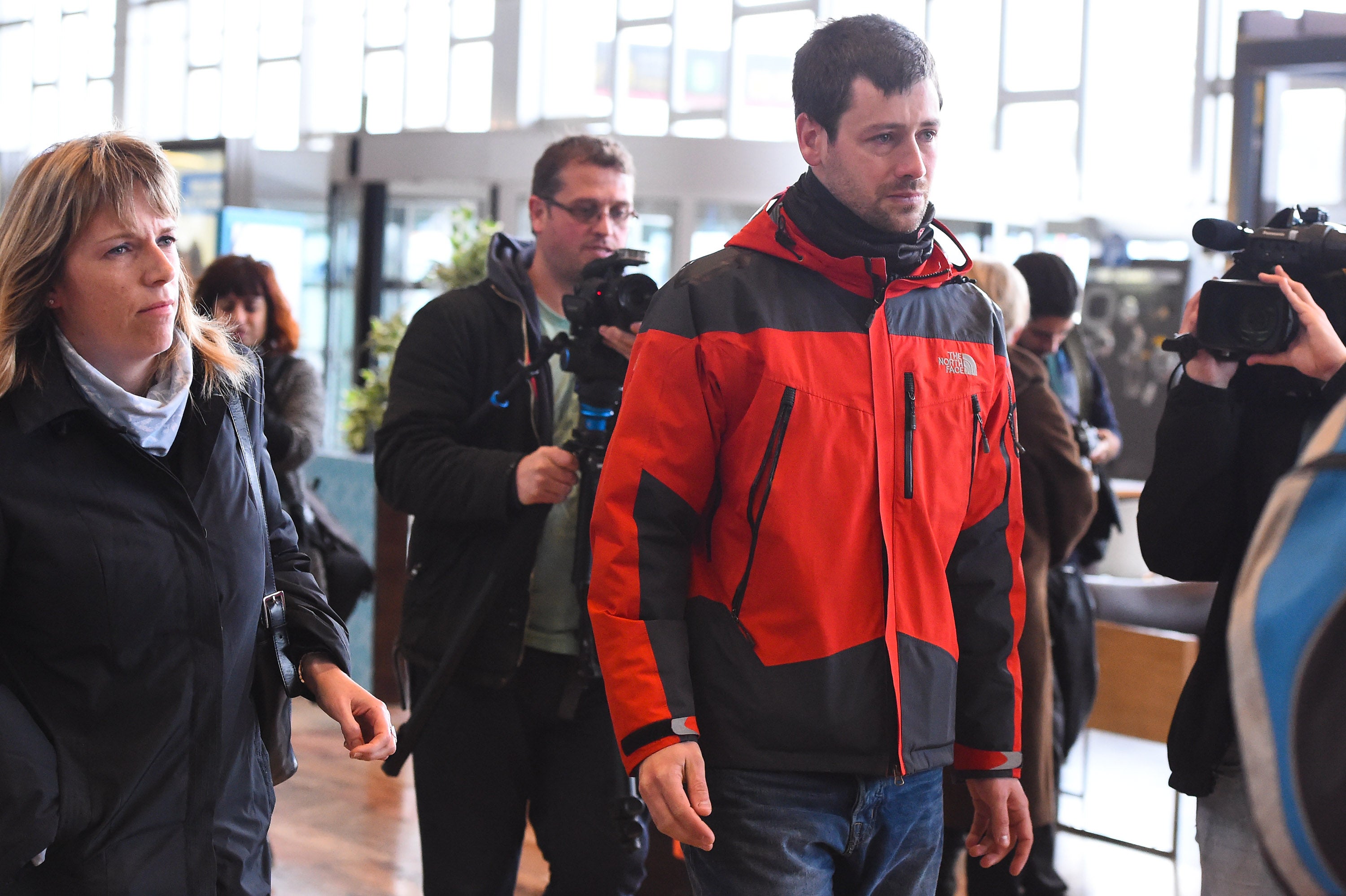 A relative of passengers who died in the Germanwings crash arrives at Barcelona airport