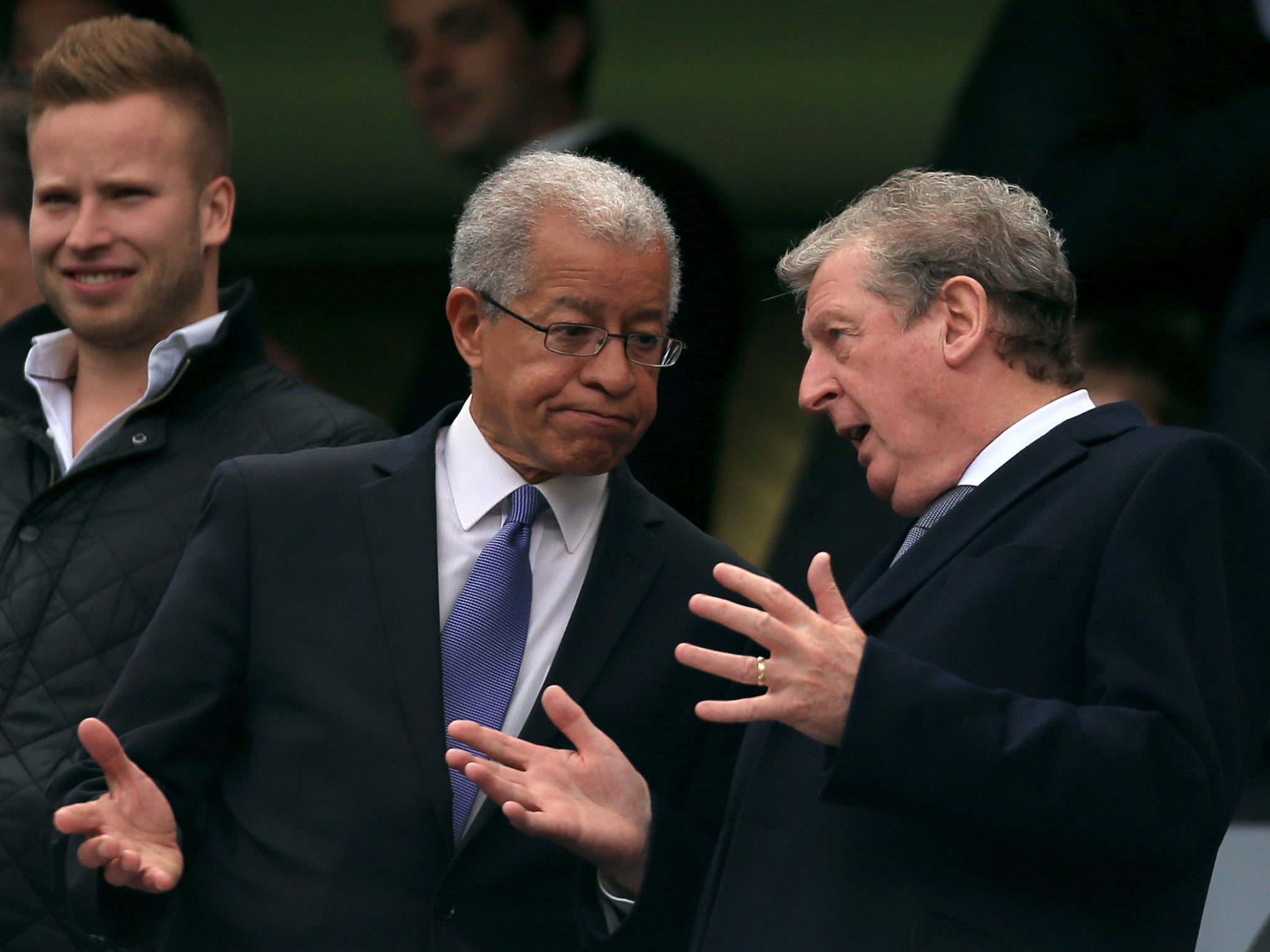 Kick it Out chairman Lord Ouseley (left) said clubs who do not implement proposals should be fined