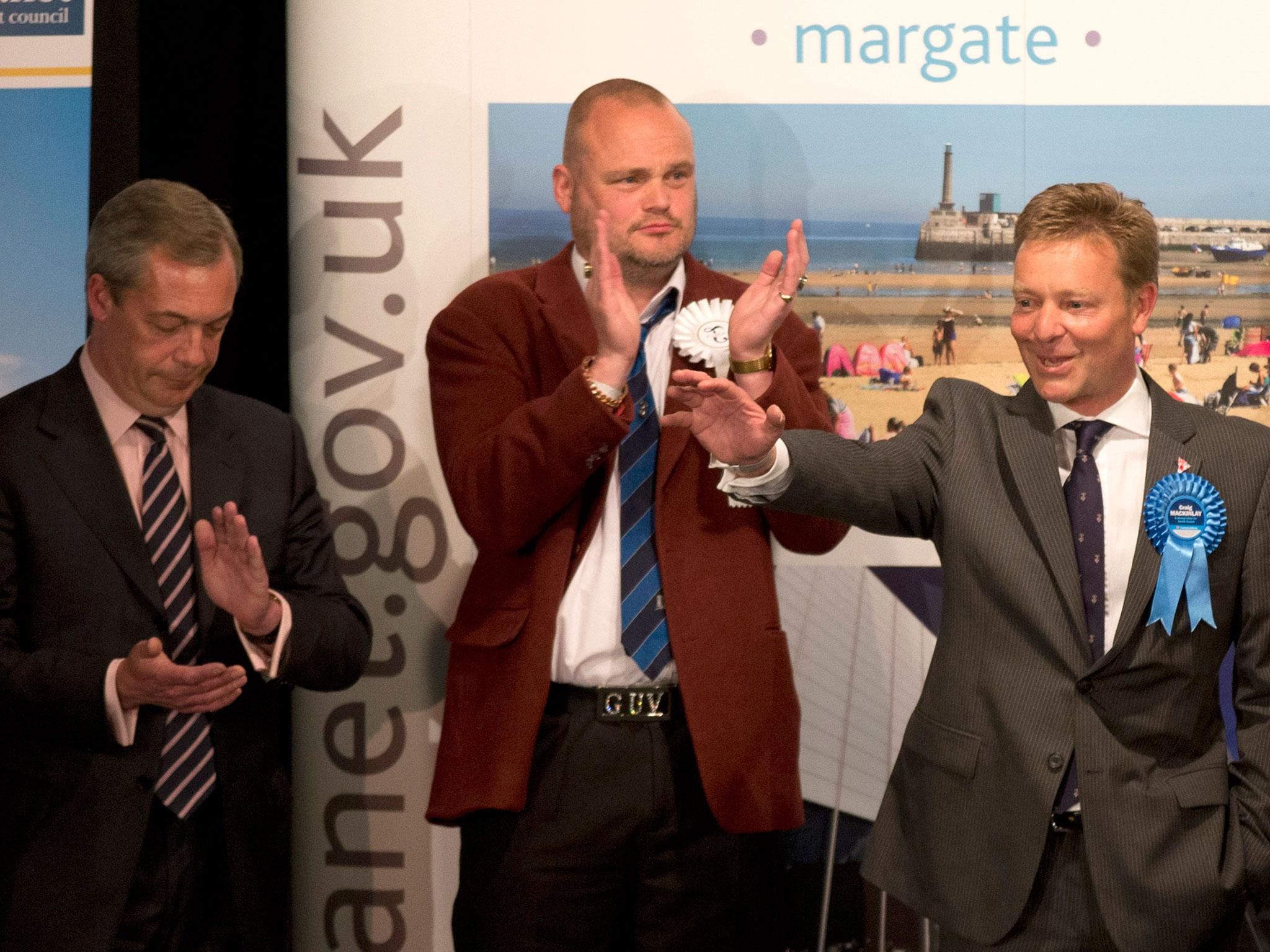 The Conservative Party's Craig Mackinlay waves after winning the count for the South Thanet seat