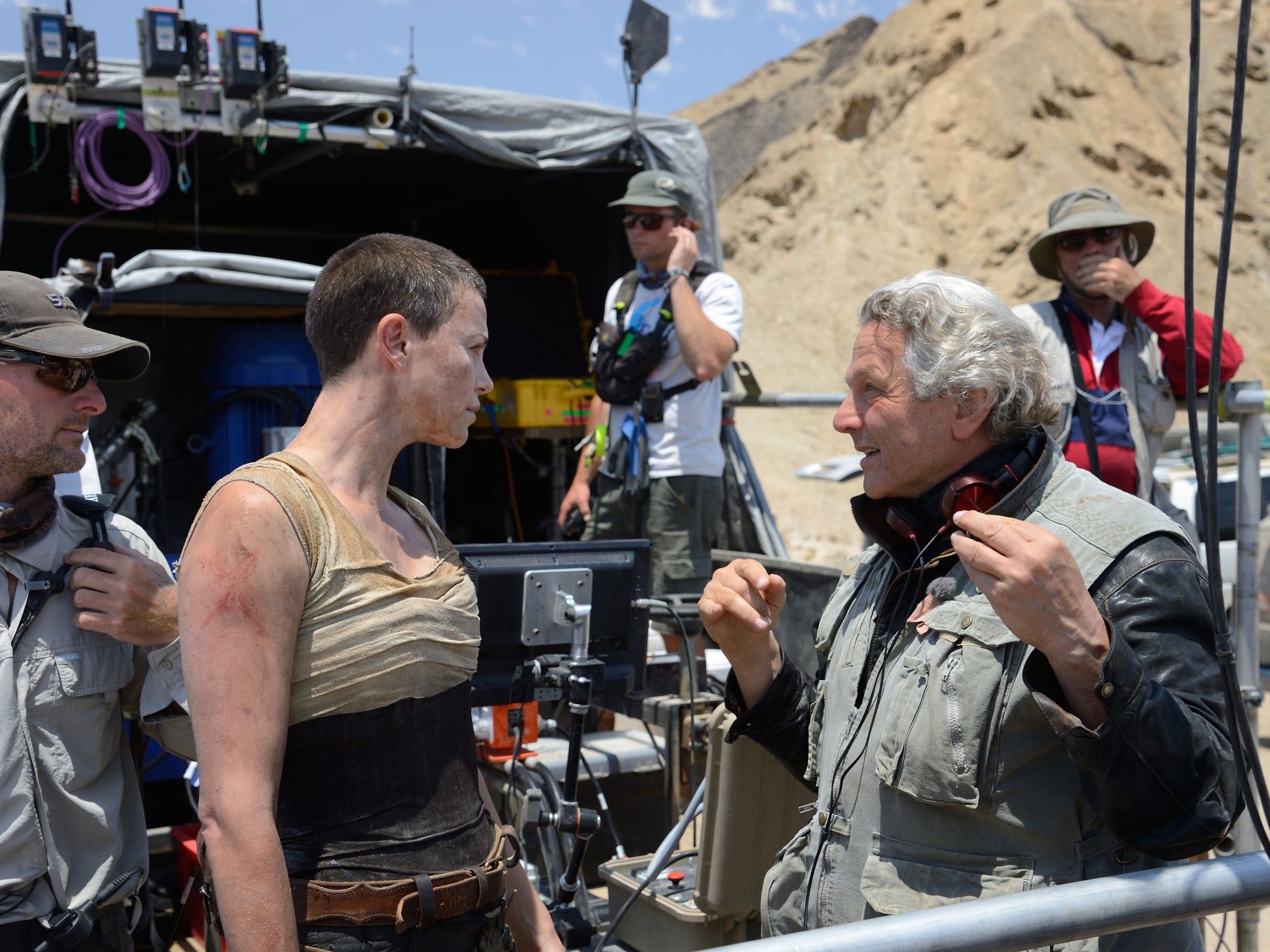 Charlize Theron with director George Miller on the set of Mad Max: Fury Road