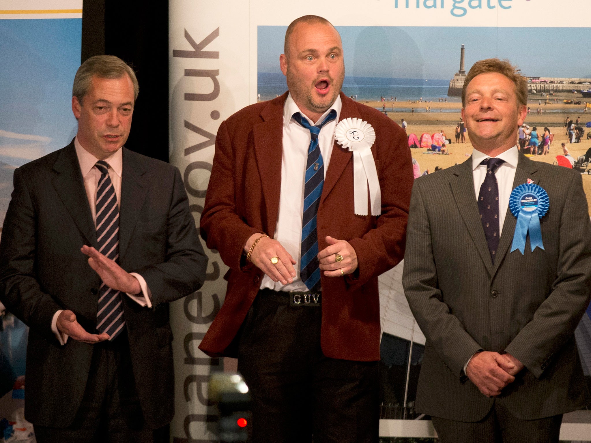 Craig Mackinlay (right) after winning the South Thanet seat, beside defeated rivals Nigel Farage and Al Murray