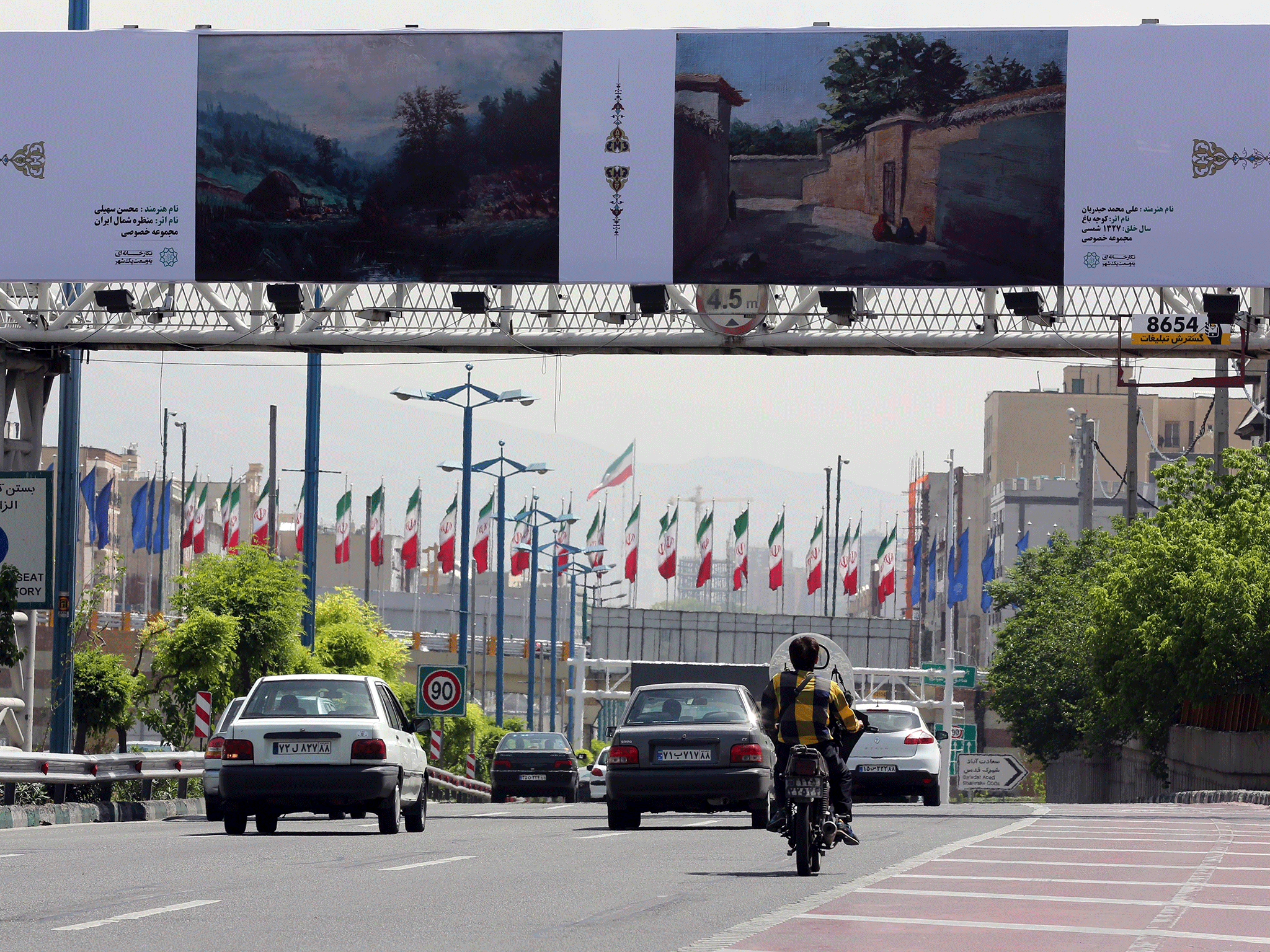 Billboards show both Western and Eastern art instead of adverts