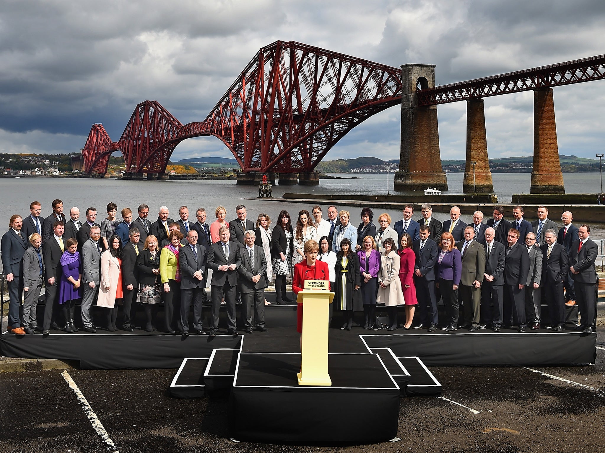 Nicola Sturgeon is joined by the SNP's newly elected MPs in front of the Forth Rail Bridge