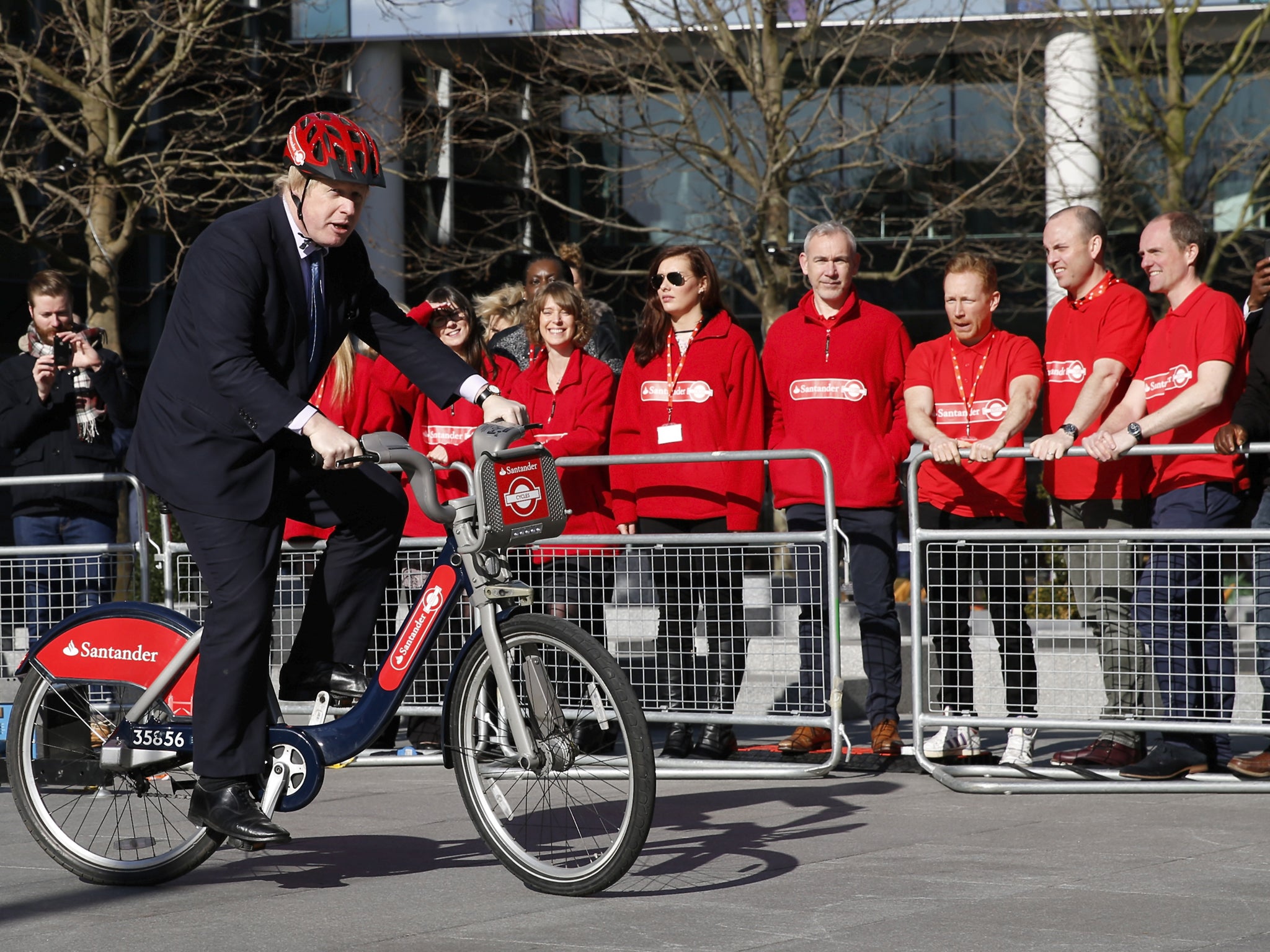 Mayor of London, Boris Johnson rides a bicycle during the announcement of Santander as the new sponsor of Santander Cycles on 27, 2015 in London, England