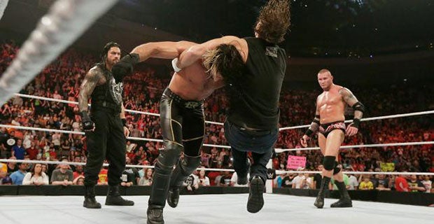 Dean Ambrose hits Seth Rollins with dirty deeds