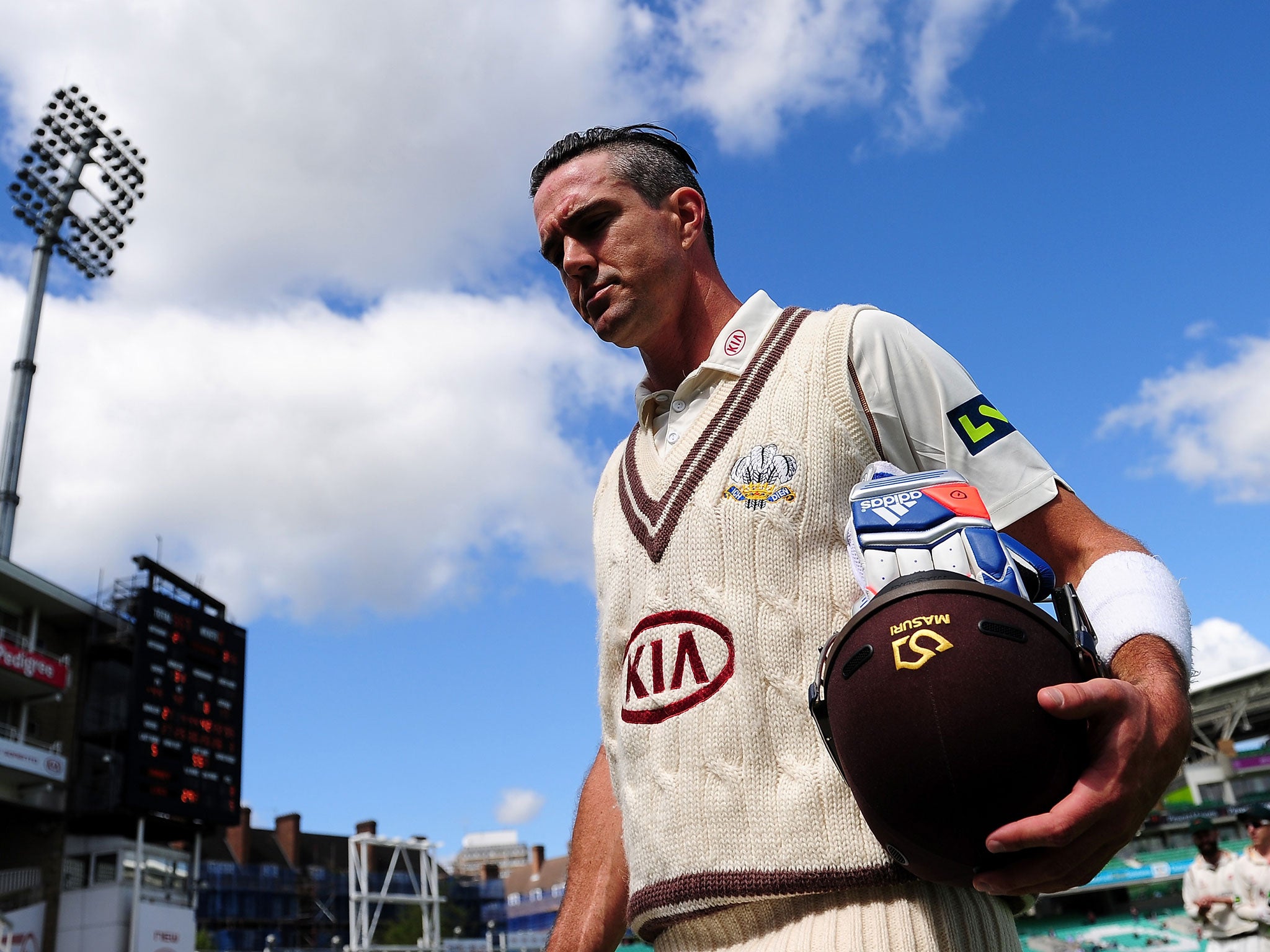 Kevin Pietersen leaves the field after being left stranded on 355 not out