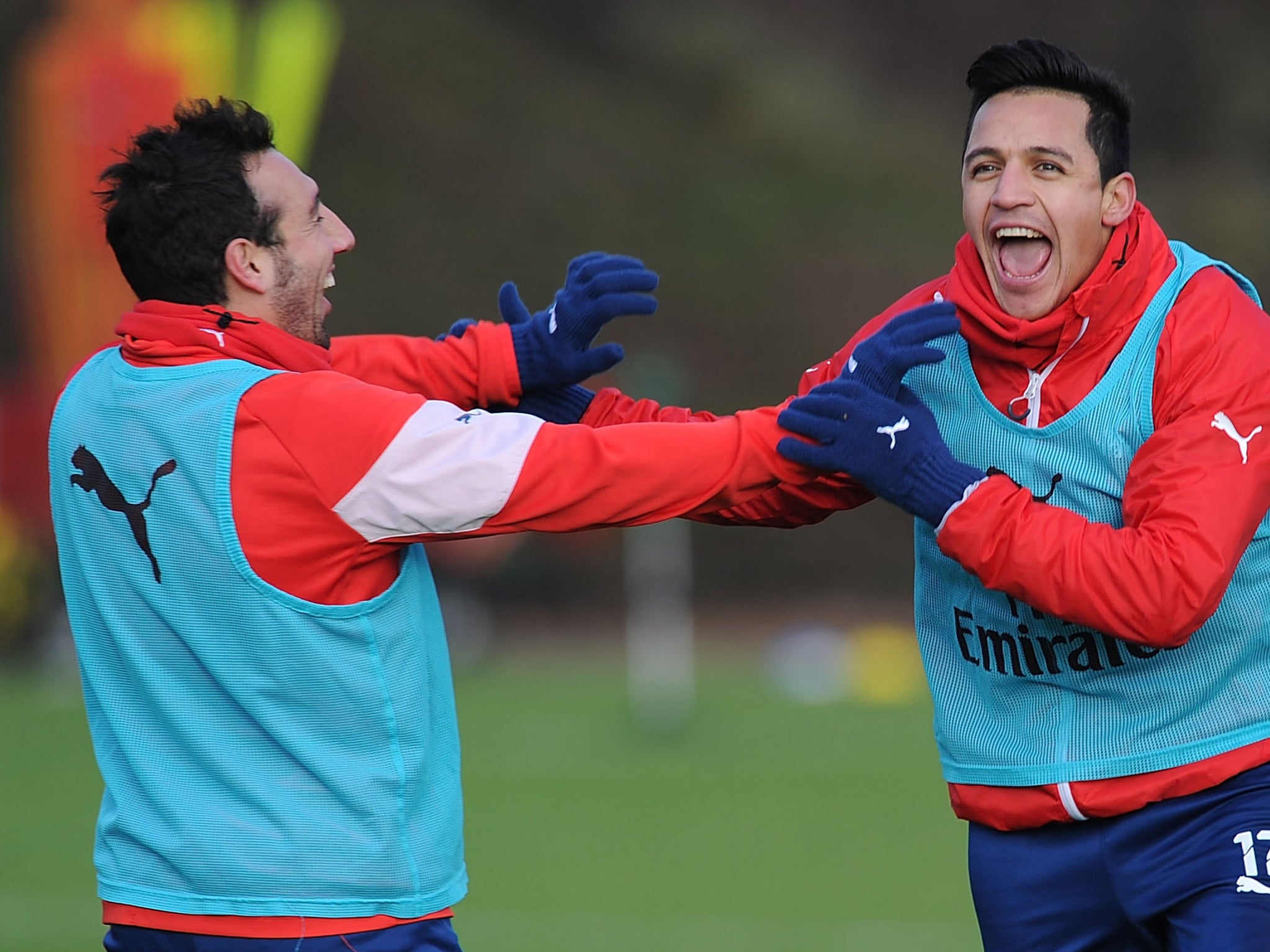 Alexis Sanchez and Santi Cazorla