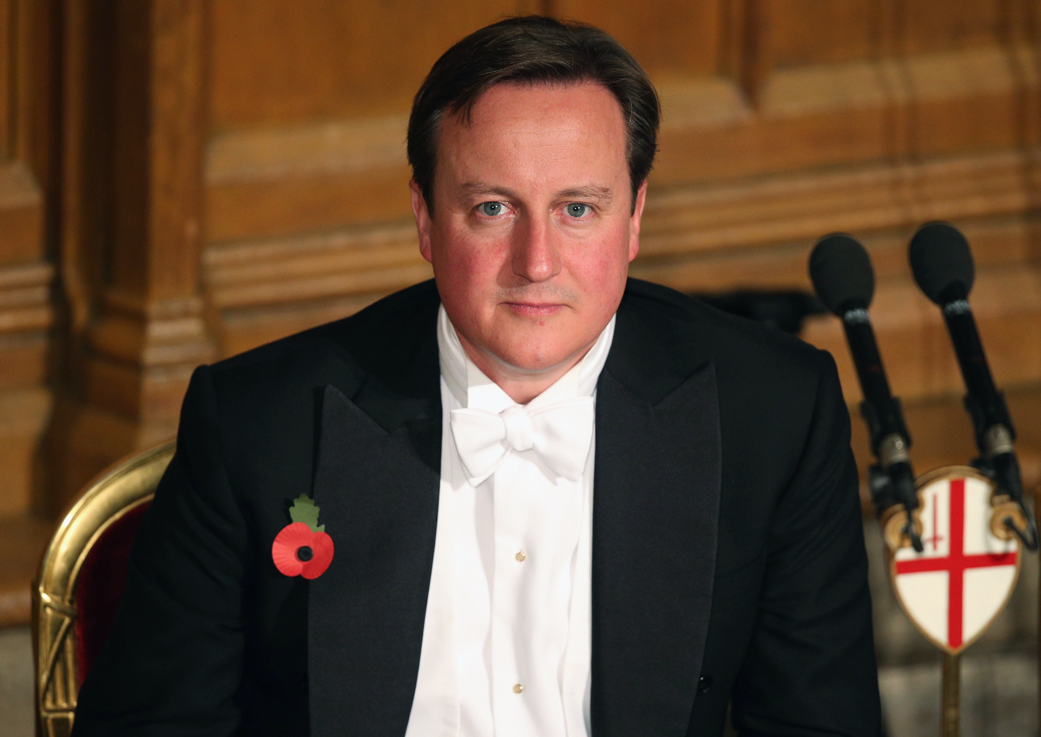 David Cameron listens to the speeches in the Guildhall during The Lord Mayor's Banquet 2013