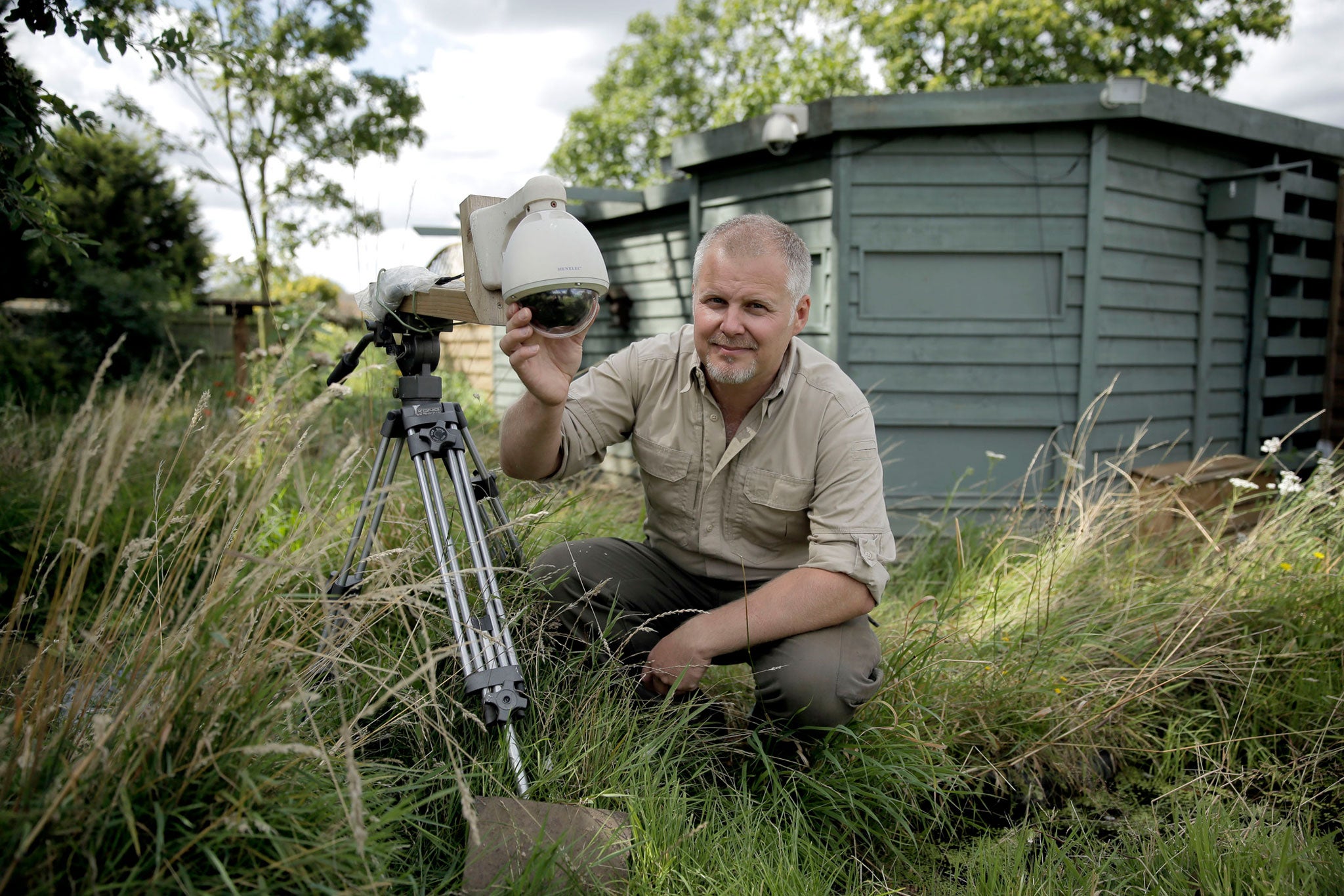 Jason with one of his many cameras set-ups in his garden