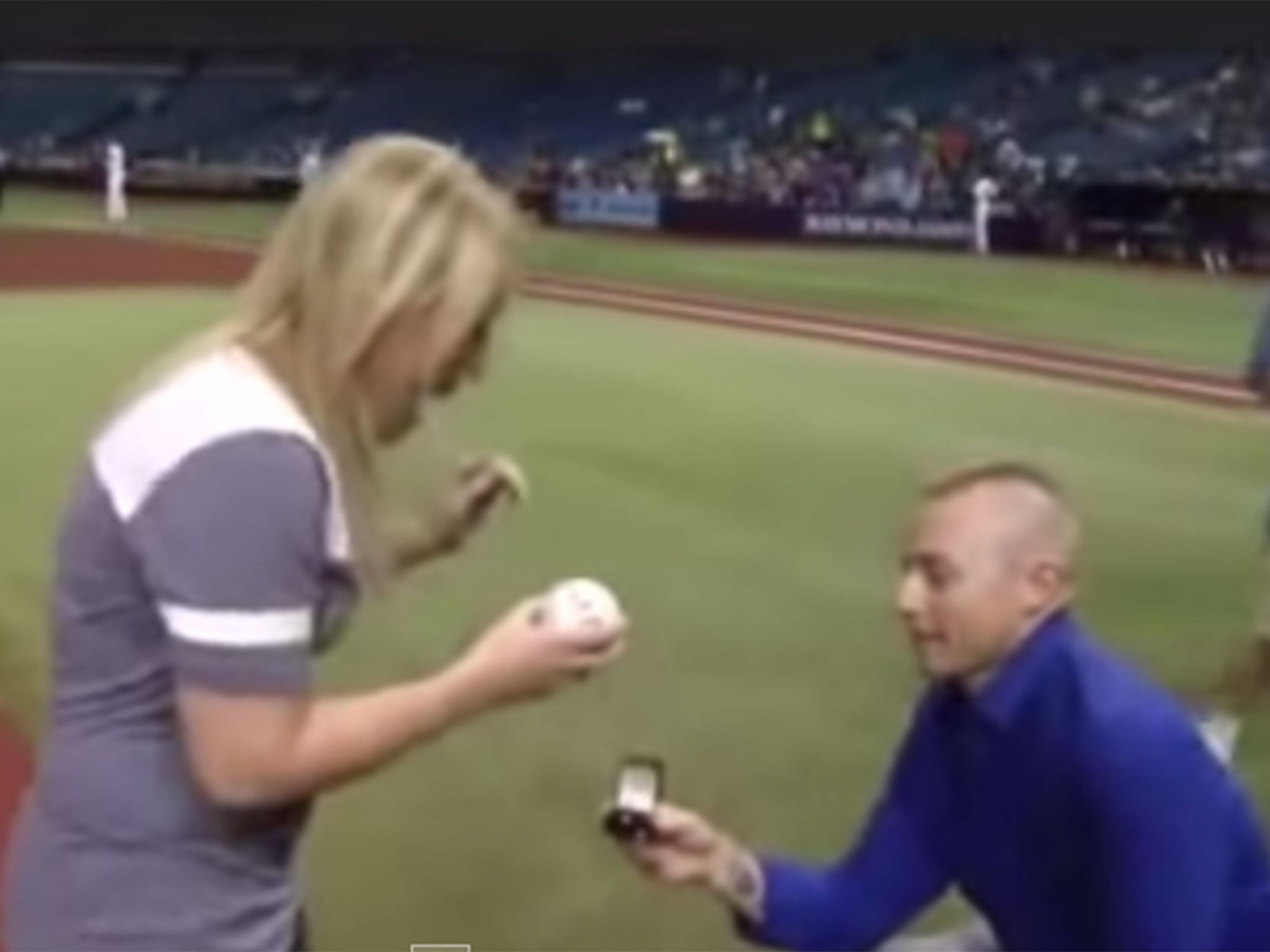 Cameron Hill scribbled the words 'will you marry me?' on a baseball to propose in 2015 YouTube