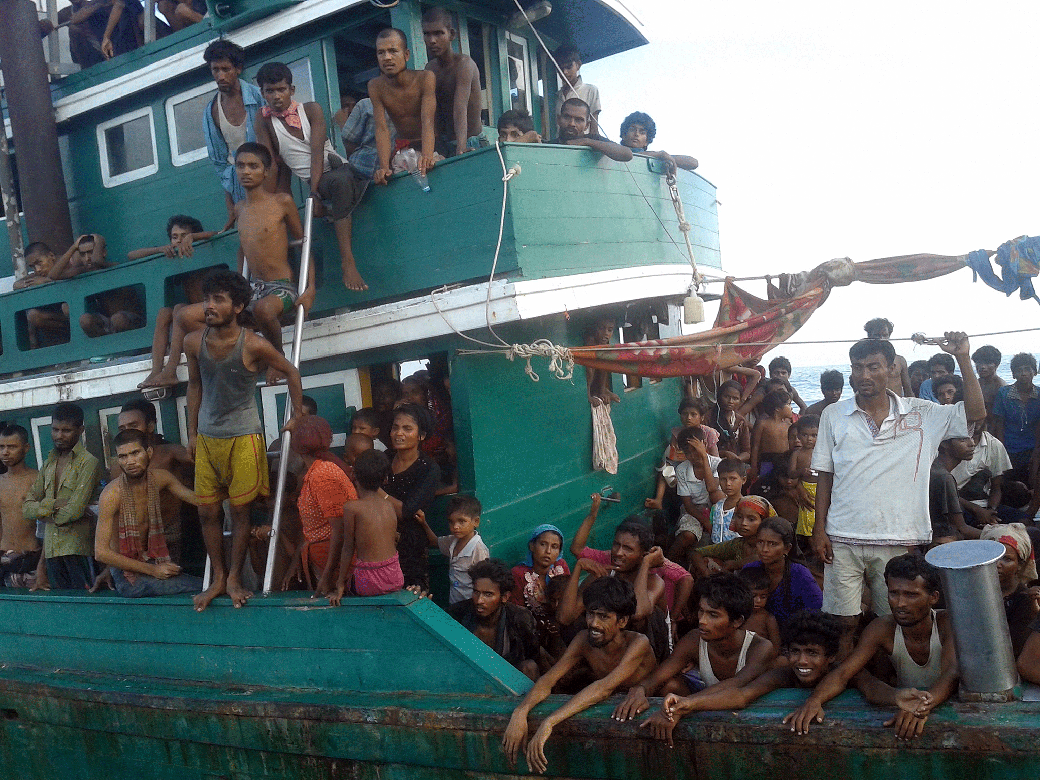 Rohingya migrants are pictured on a boat off the southern Thai island of Koh Lipe in the Andaman Sea on May 14, 2015