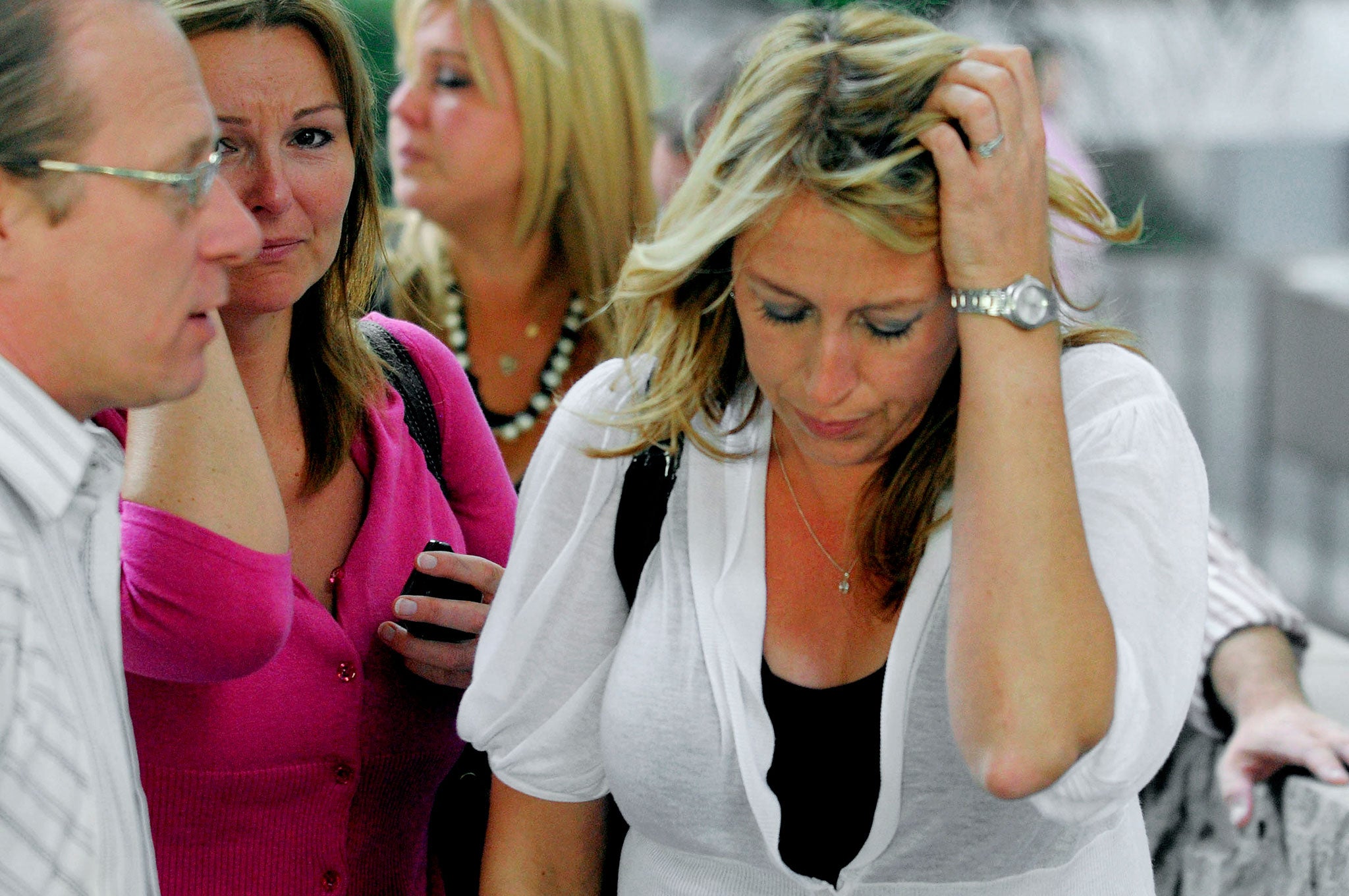 Sarah Key-Marer, right, mother of victim Lauren Sauren Key, leaves the courthouse in Los Angeles following the second mistrial of Cameron Brown on murder charges in the death of his 4-year-old daughter Lauren in November 2000