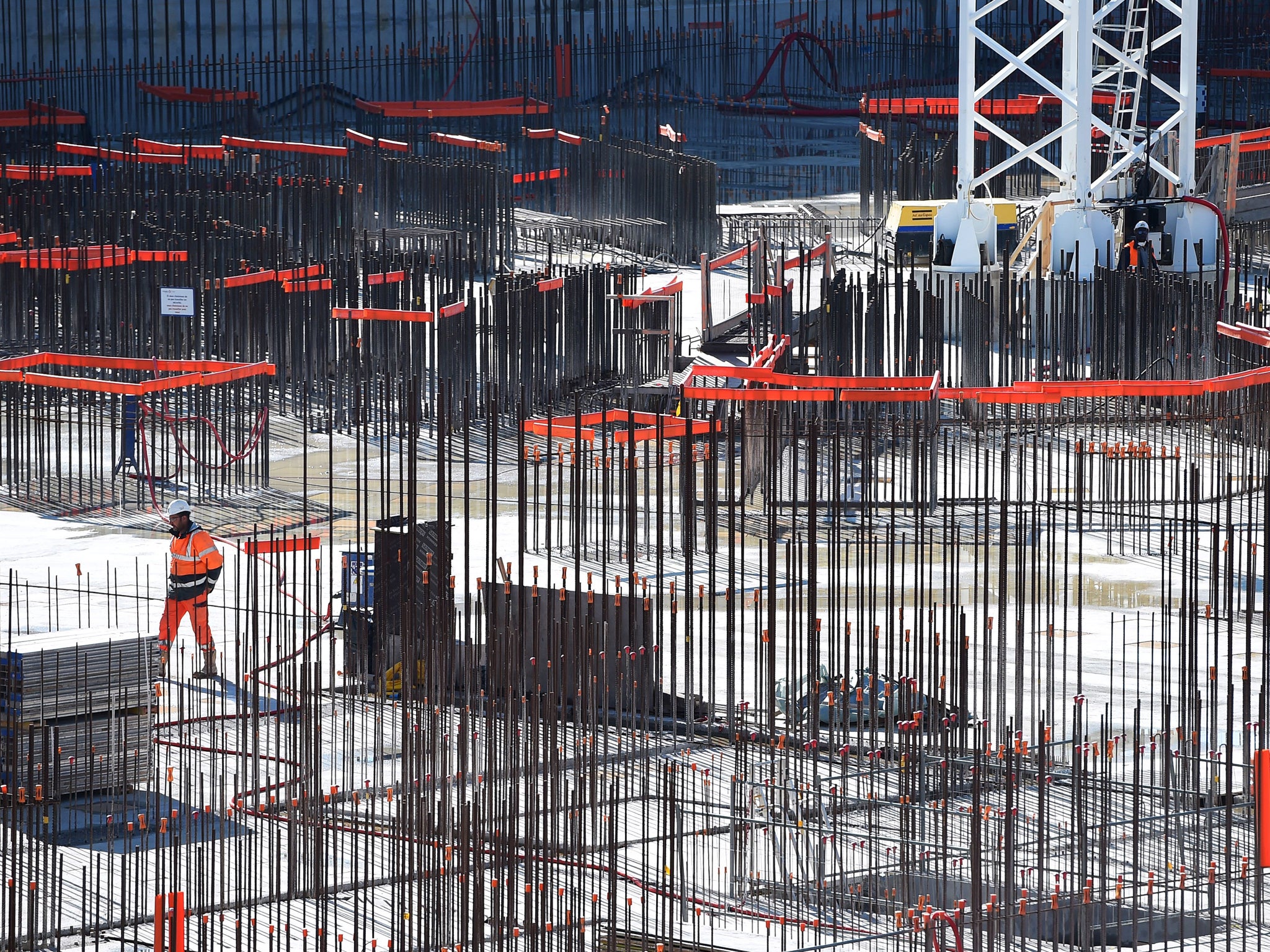 A technician works at the construction site of the International Thermonuclear Experimental Reactor (ITER) on November 21, 2014 in Saint-Paul-lez-Durance, southern France