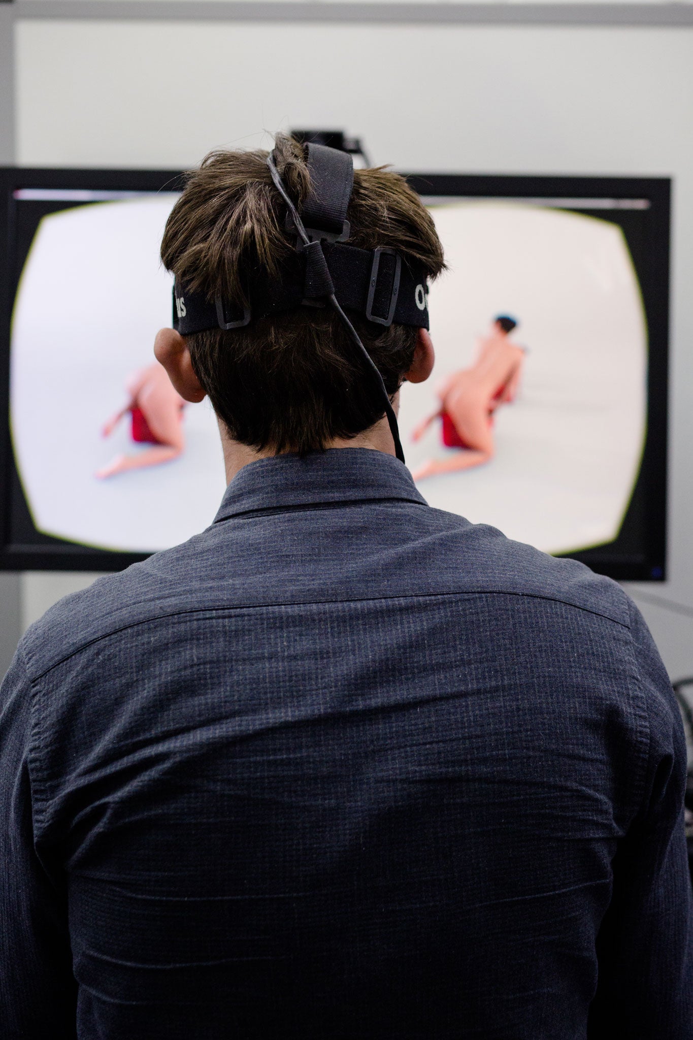 Oscar Quine watches a demo of VR porn on an Oculus Rift headset