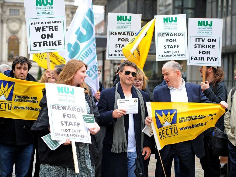 A Simon Cowell lookalike joins the strike outside ITV
