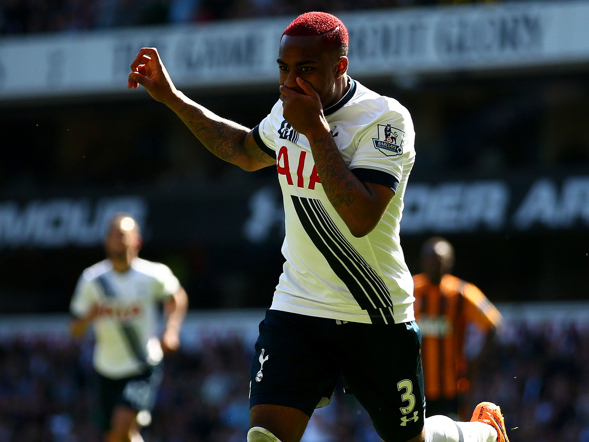 Danny Rose shows off his newly-dyed red hair after scoring Spurs' second