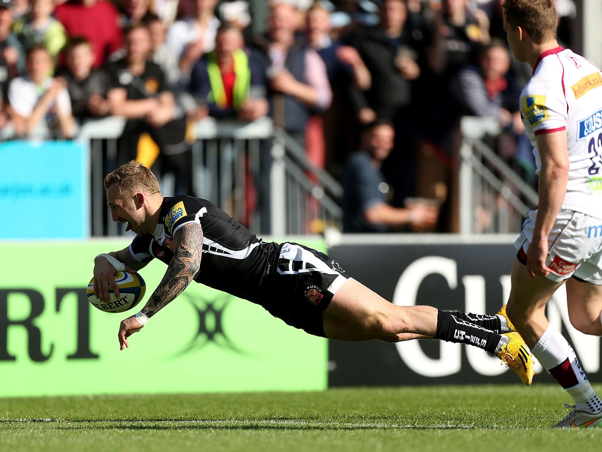 Max Boddily dives over for a try for Exeter Chiefs