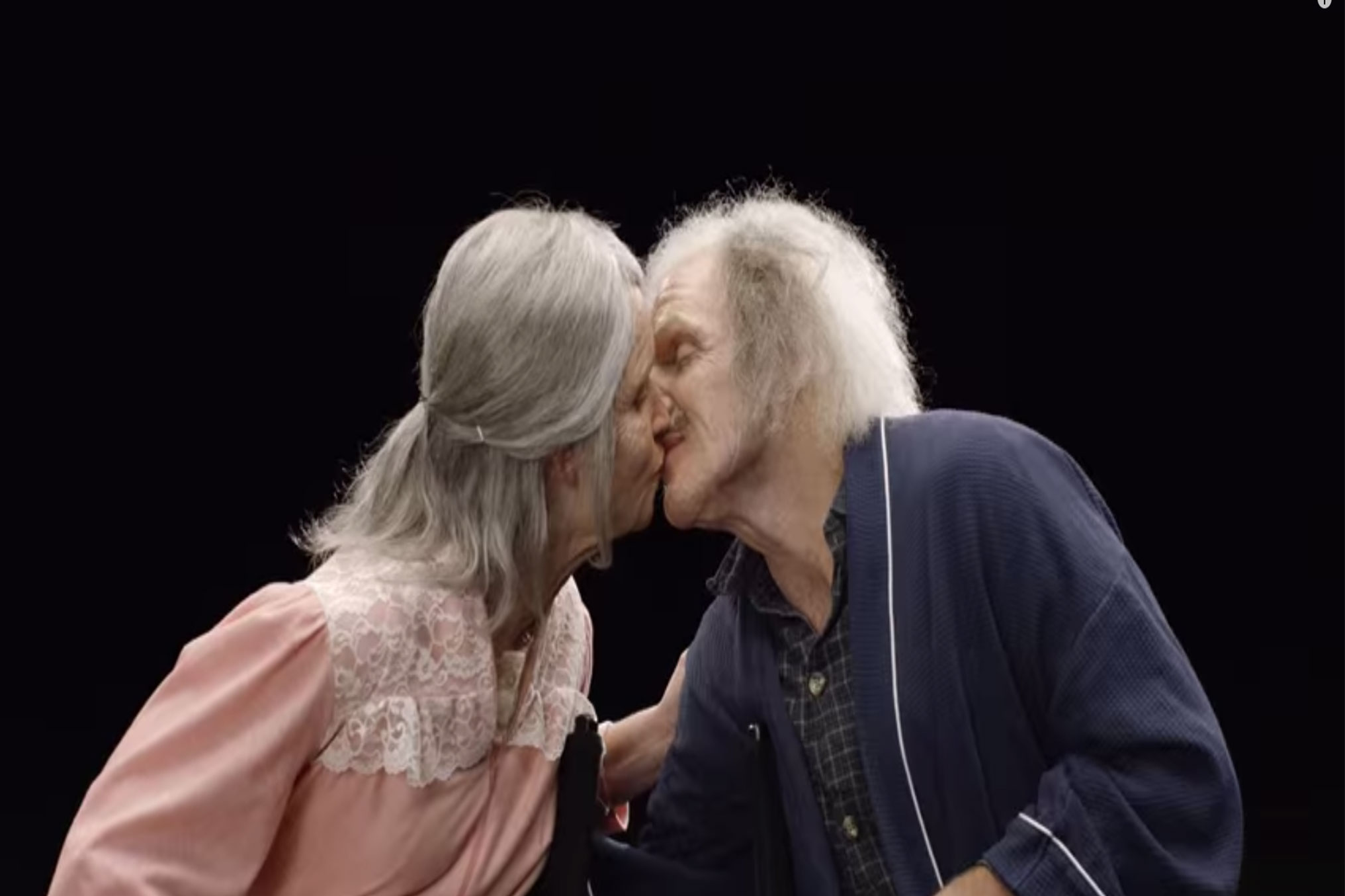 A young couple are made up to look like they are elderly