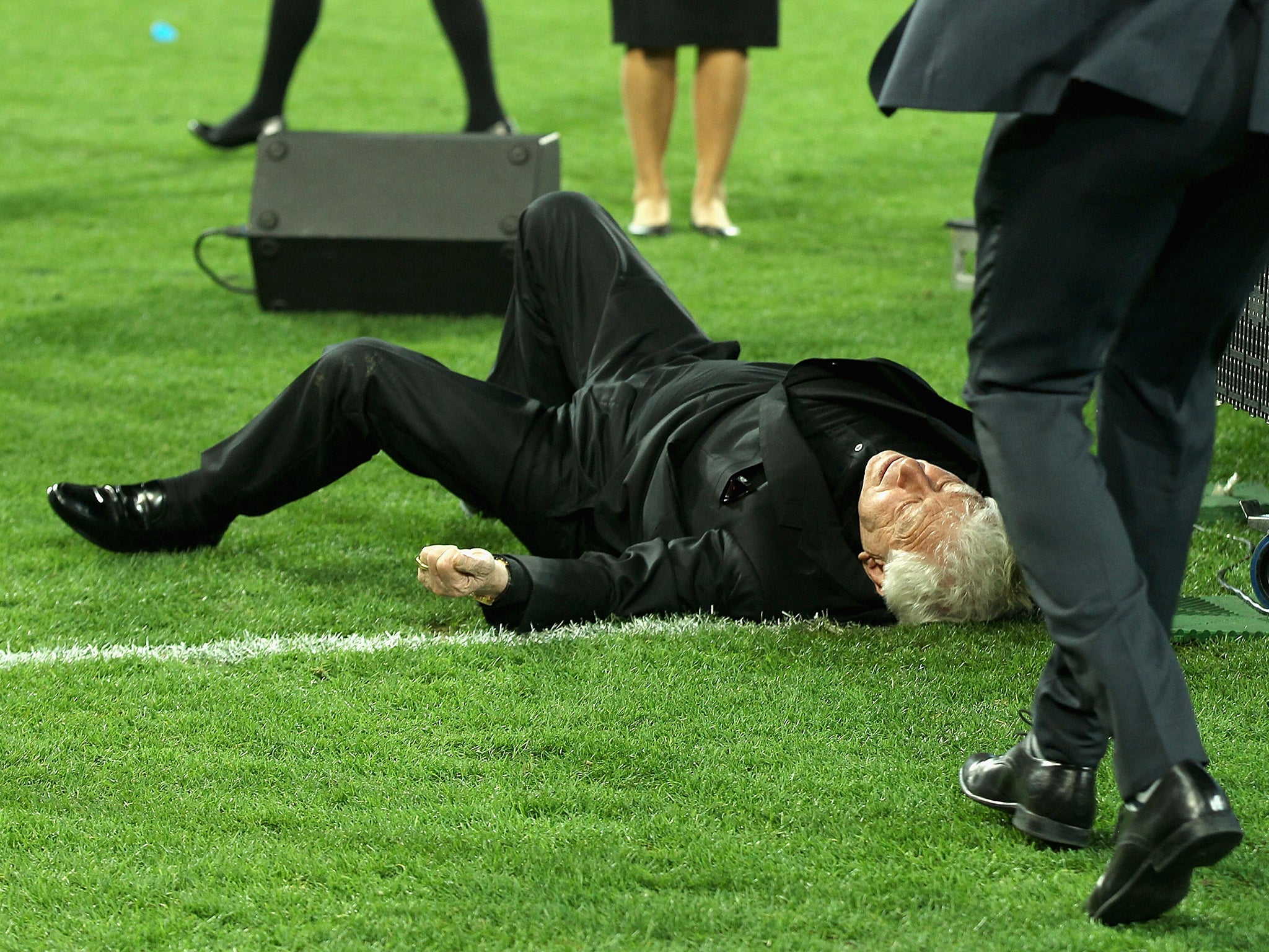 Frank Lowy lands on the pitch